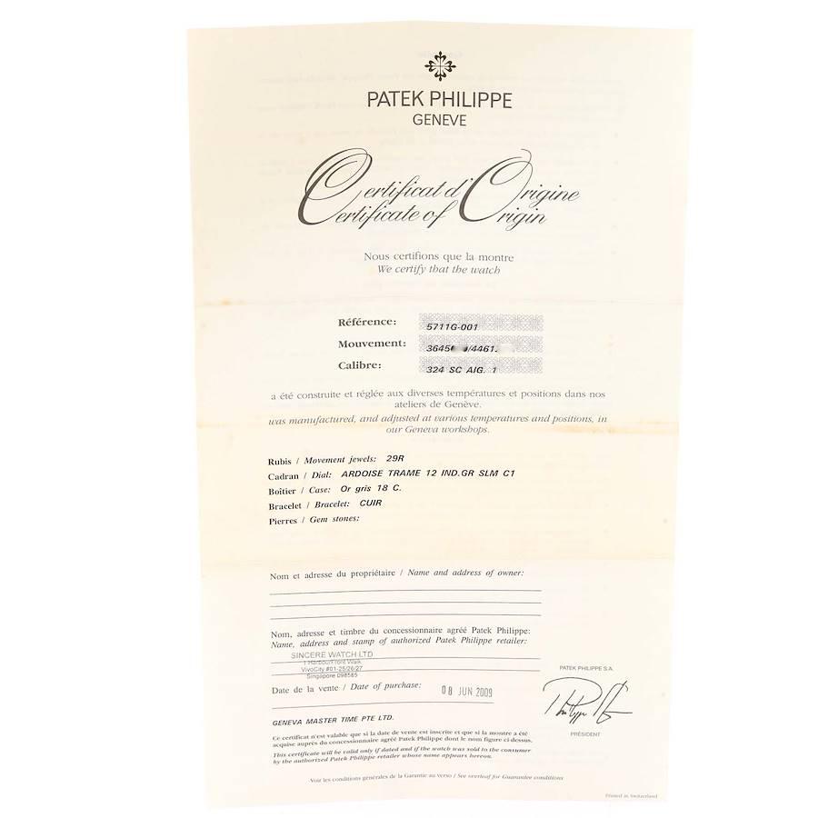 Patek Philippe Nautilus 18K Weißgold Schwarze Herrenuhr 5711 Box Papiere mit schwarzem Riemen im Angebot 6