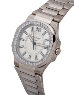 Patek Philippe Nautilus 18 Karat Gold Silver Dial Diamond Bezel B&P 7010/1G-001