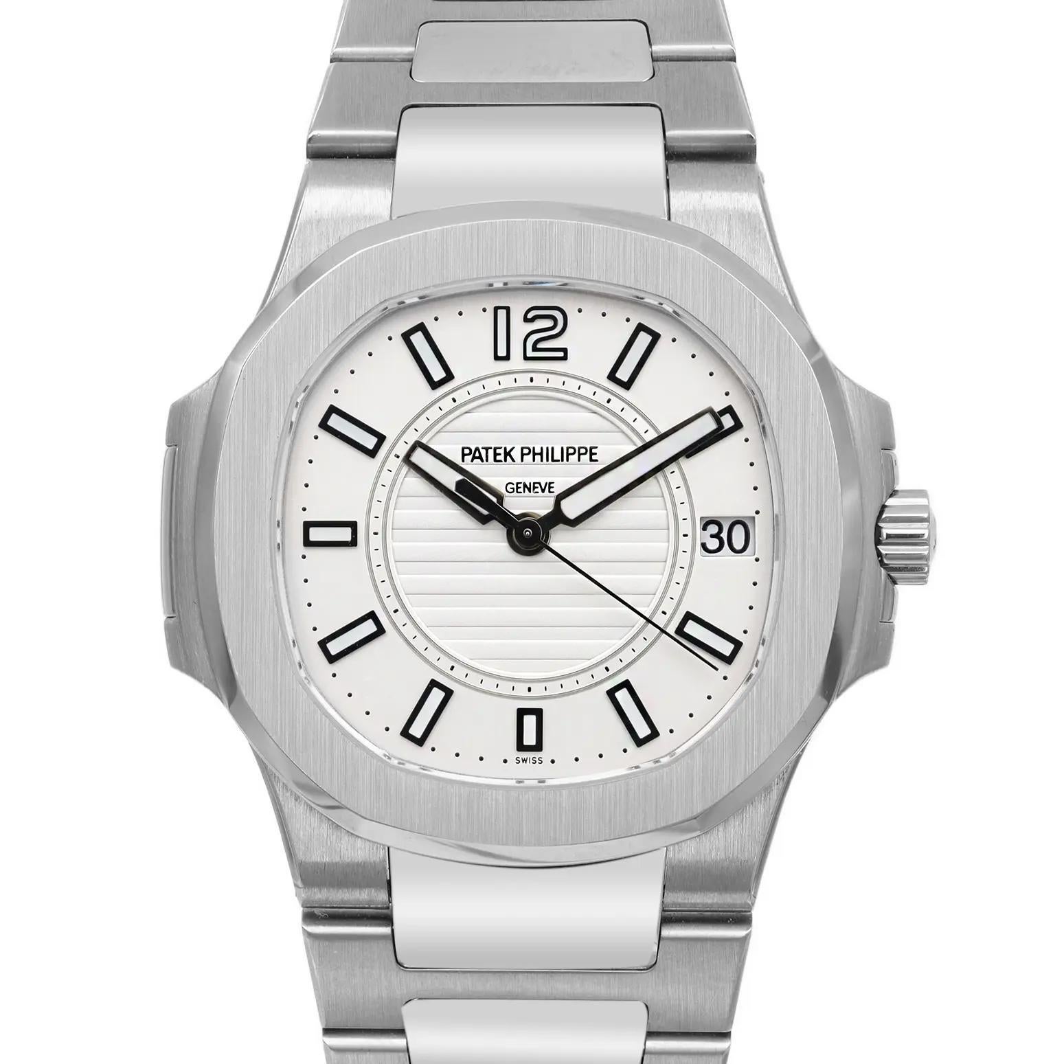 Patek Philippe Nautilus 32mm 18K White Gold Silver Dial Ladies Watch 7011/1G-001 In Excellent Condition In New York, NY