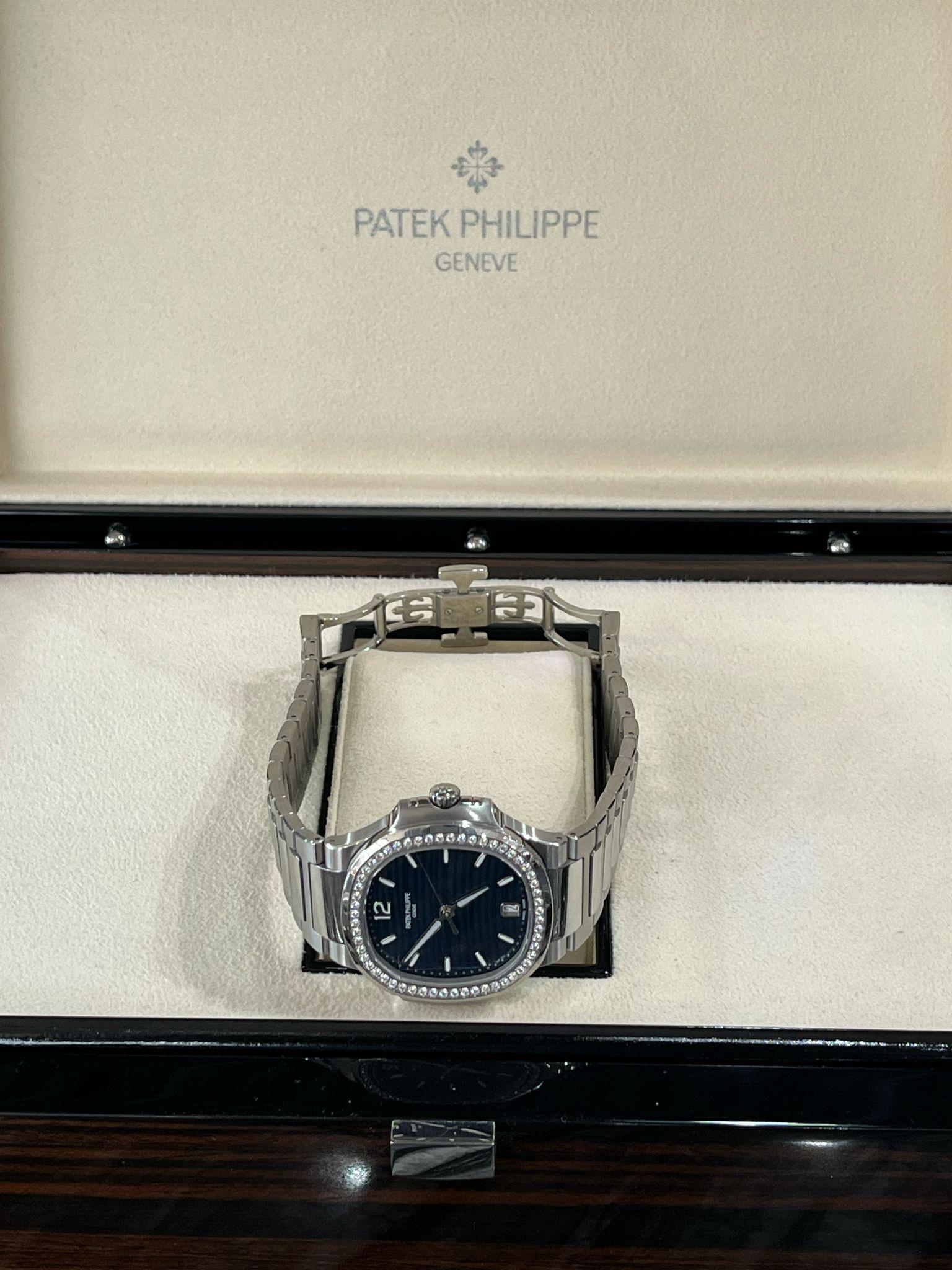 Patek Philippe Nautilus 35.2mm Blue Dial Diamond Bezel Ladies Watch 7118/1200A For Sale 9