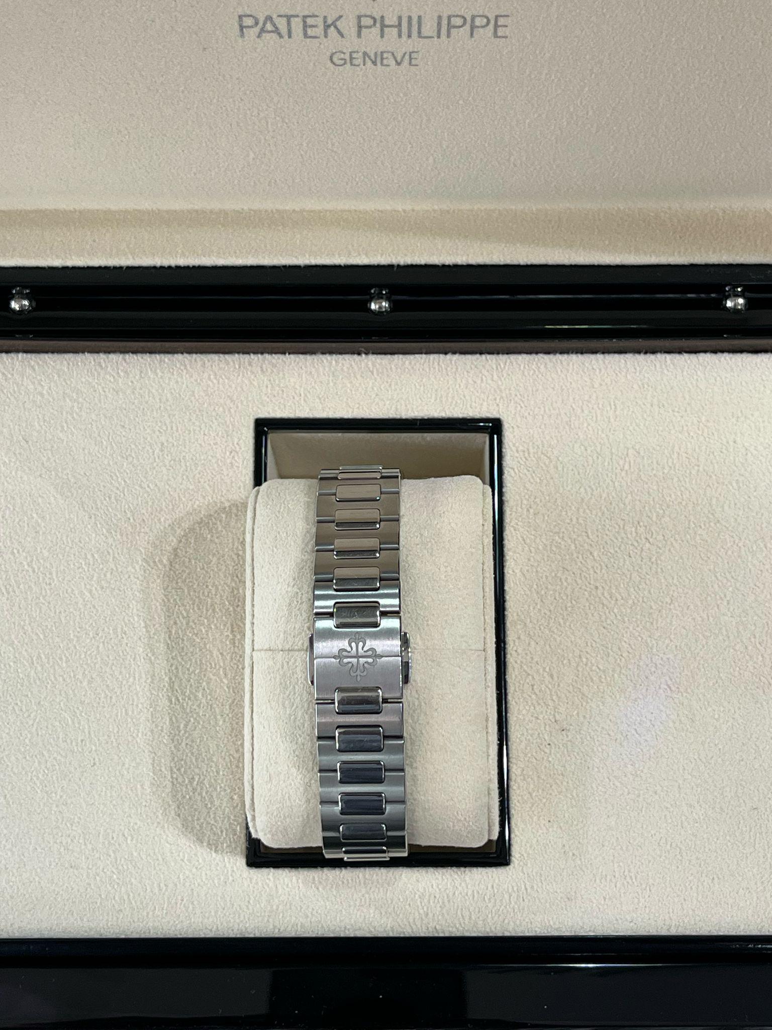 Patek Philippe Nautilus 35.2mm Blue Dial Diamond Bezel Ladies Watch 7118/1200A For Sale 13