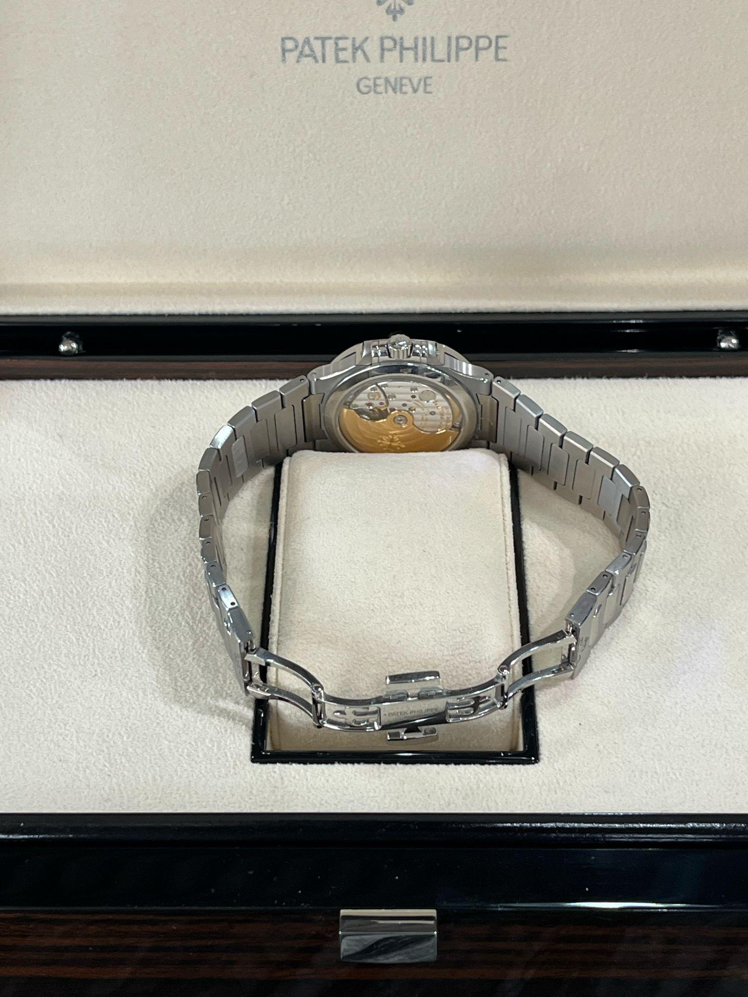 Patek Philippe Nautilus 35.2mm Blue Dial Diamond Bezel Ladies Watch 7118/1200A For Sale 14