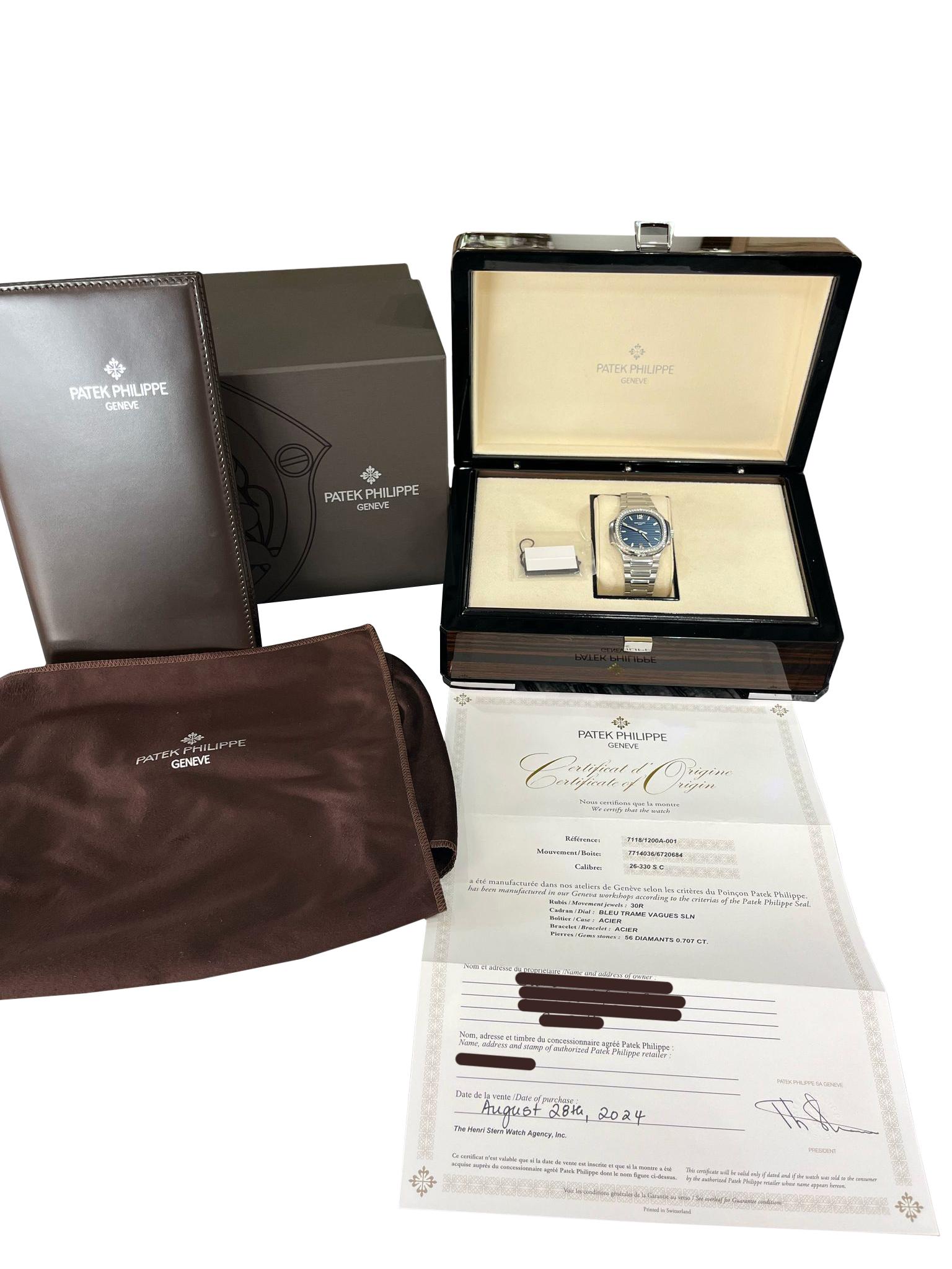 Modernist Patek Philippe Nautilus 35.2mm Blue Dial Diamond Bezel Ladies Watch 7118/1200A For Sale