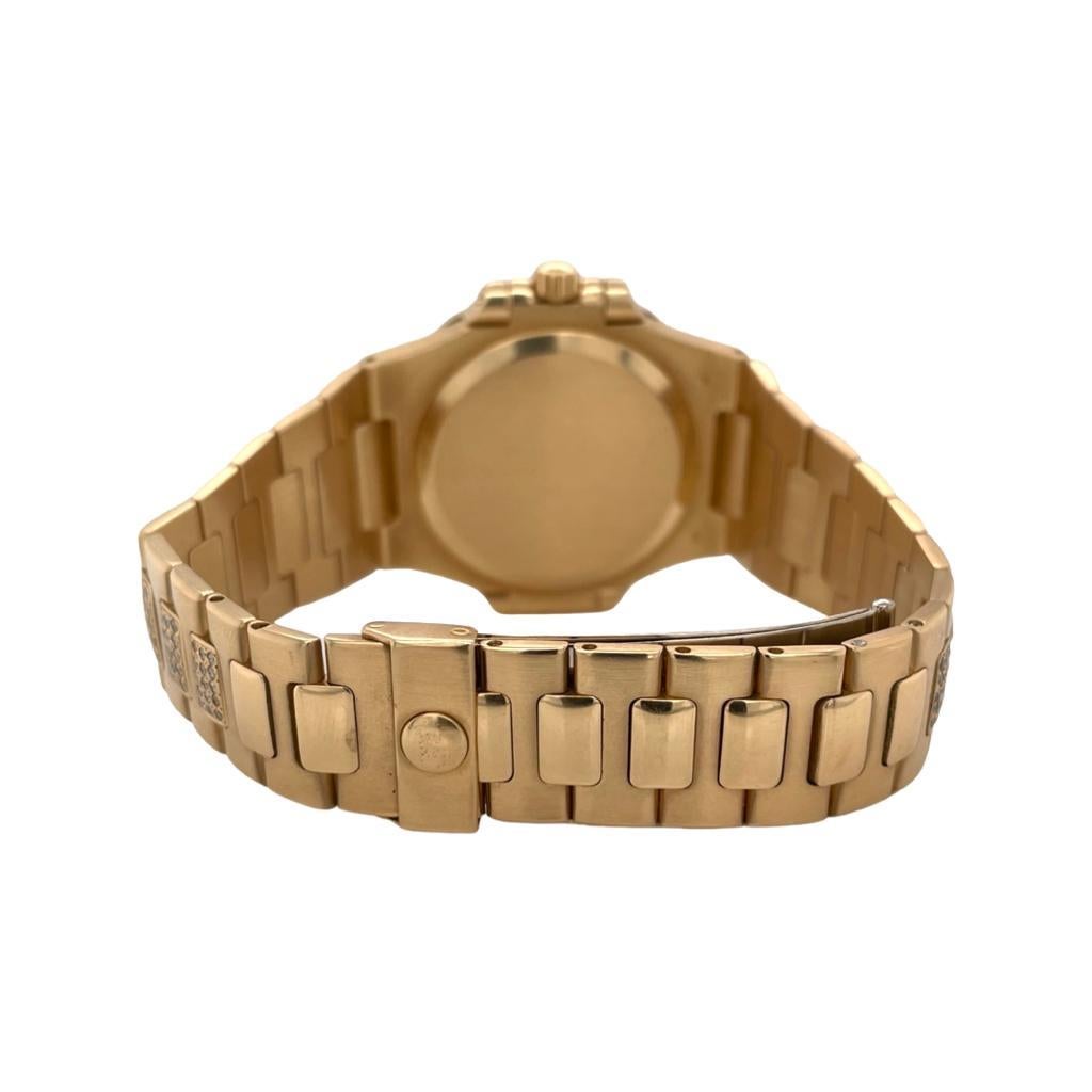 Round Cut Patek Philippe Nautilus 3800/1 in 18k Yellow Gold Diamond Bracelet & Hour Marker