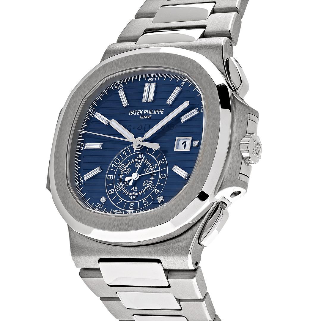 Celebrating the 40th Anniversary, the Patek Philippe Nautilus 44mm design is deemed as what is the largest case featured in the family of the Nautilus. The blue dial features baguette diamond-set indexes surrounded by a white gold bezel. The watch