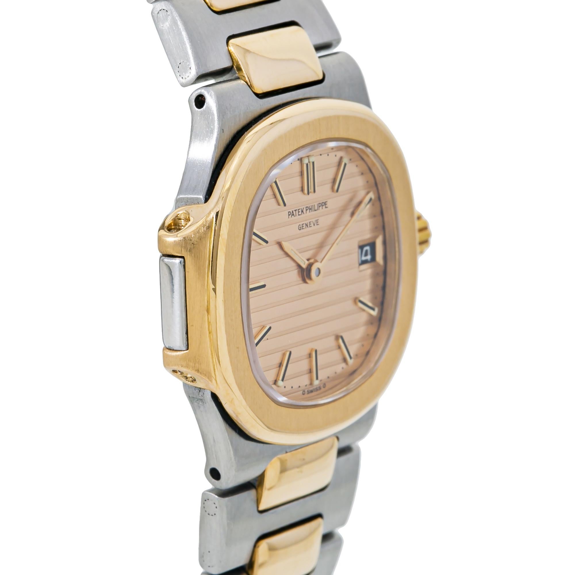 Patek Philippe Nautilus 4700, Champagne Dial, Certified In Excellent Condition In Miami, FL