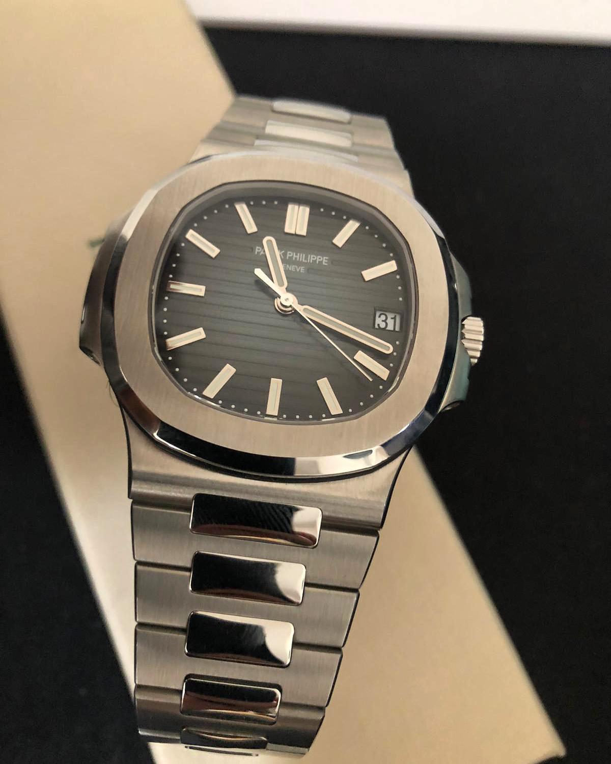 Patek Philippe 
5711/1A - NAUTILUS 
SELF-WINDING
With the rounded octagonal shape of its bezel, the ingenious porthole construction of its case, and its horizontally embossed dial, the Nautilus has epitomized the elegant sports watch since 1976.