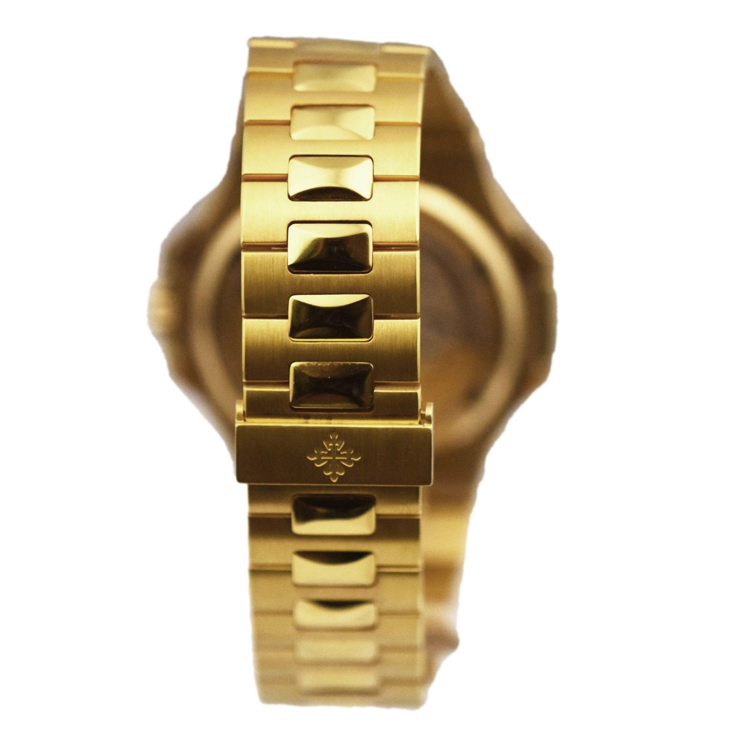 Women's or Men's Patek Philippe Nautilus 5711J in 18k Yellow Gold Silver Dial Dual Strap Watch