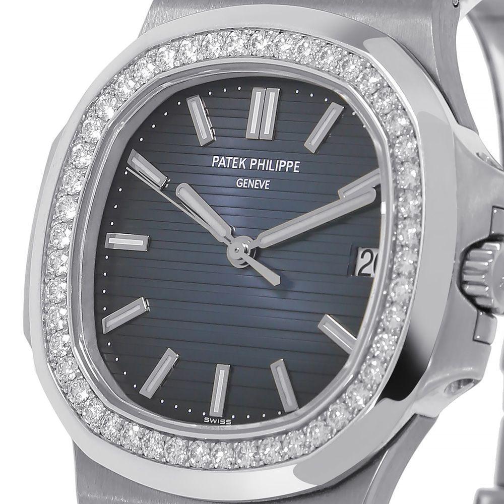 Patek Philippe Nautilus 5713/1G Diamond Bezel in 18k White Gold Watch In Good Condition In Miami, FL
