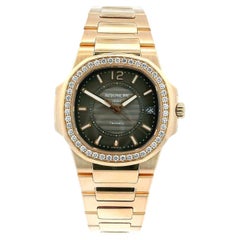 Damenuhr Patek Philippe Nautilus 7010/1R T&Co Taupe Zifferblatt & Diamant-Lünette