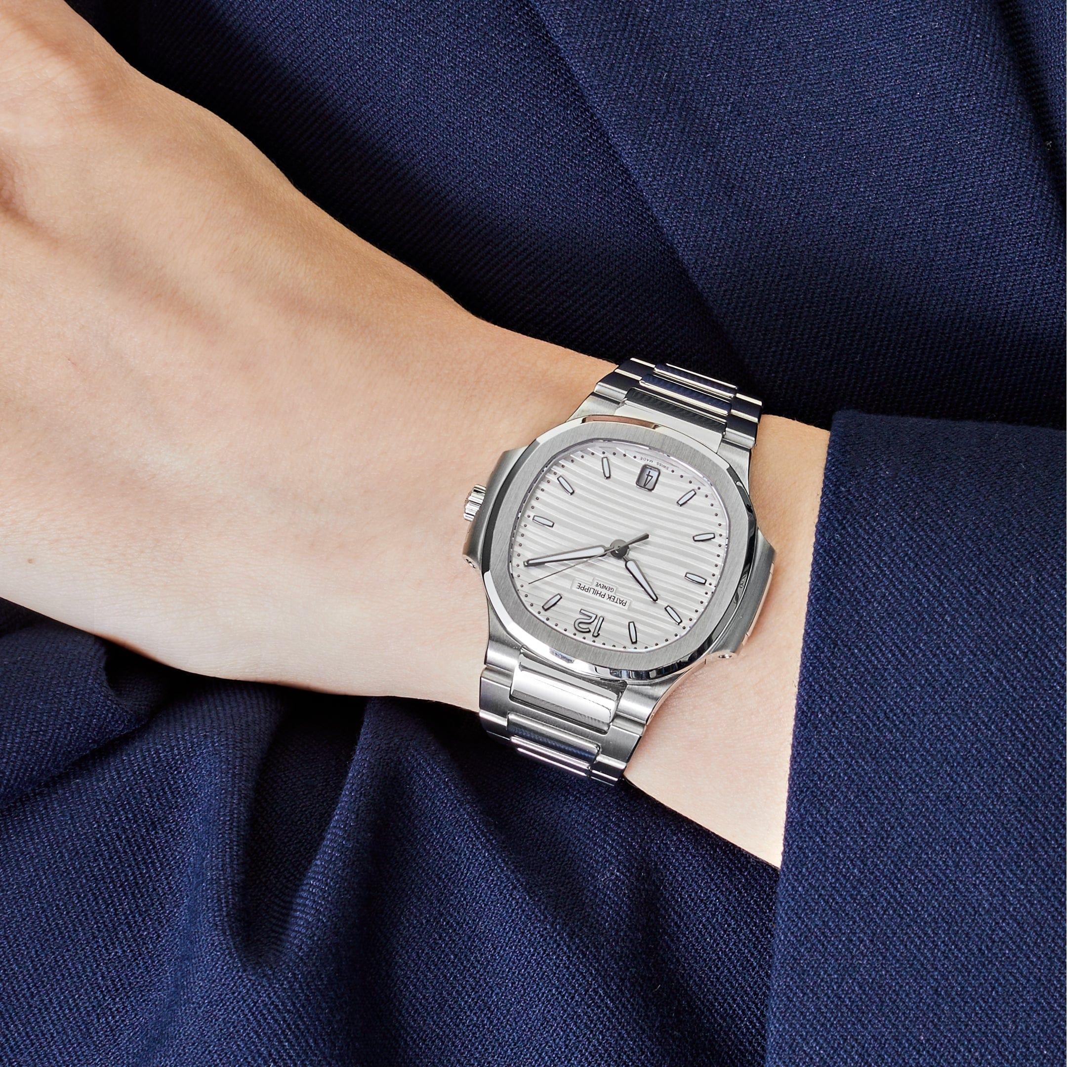Jewels Aficionado offers this Patek Philippe Nautilus 7118/1A-010 in stainless steel with a silvery opaline dial is an elegant and refined version of the iconic Nautilus design. The subtle silvery opaline dial adds depth and contrast to the