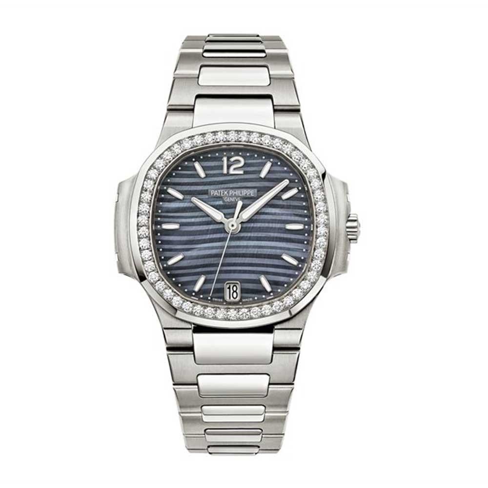This certified authentic Patek Philippe Nautilus dress watch, with the model number 7118 has a stainless steel 33 mm irregular case with screw down crown and a factory diamonds bezel. this ladies Patek Philippe Nautilus has an attractive blue dial