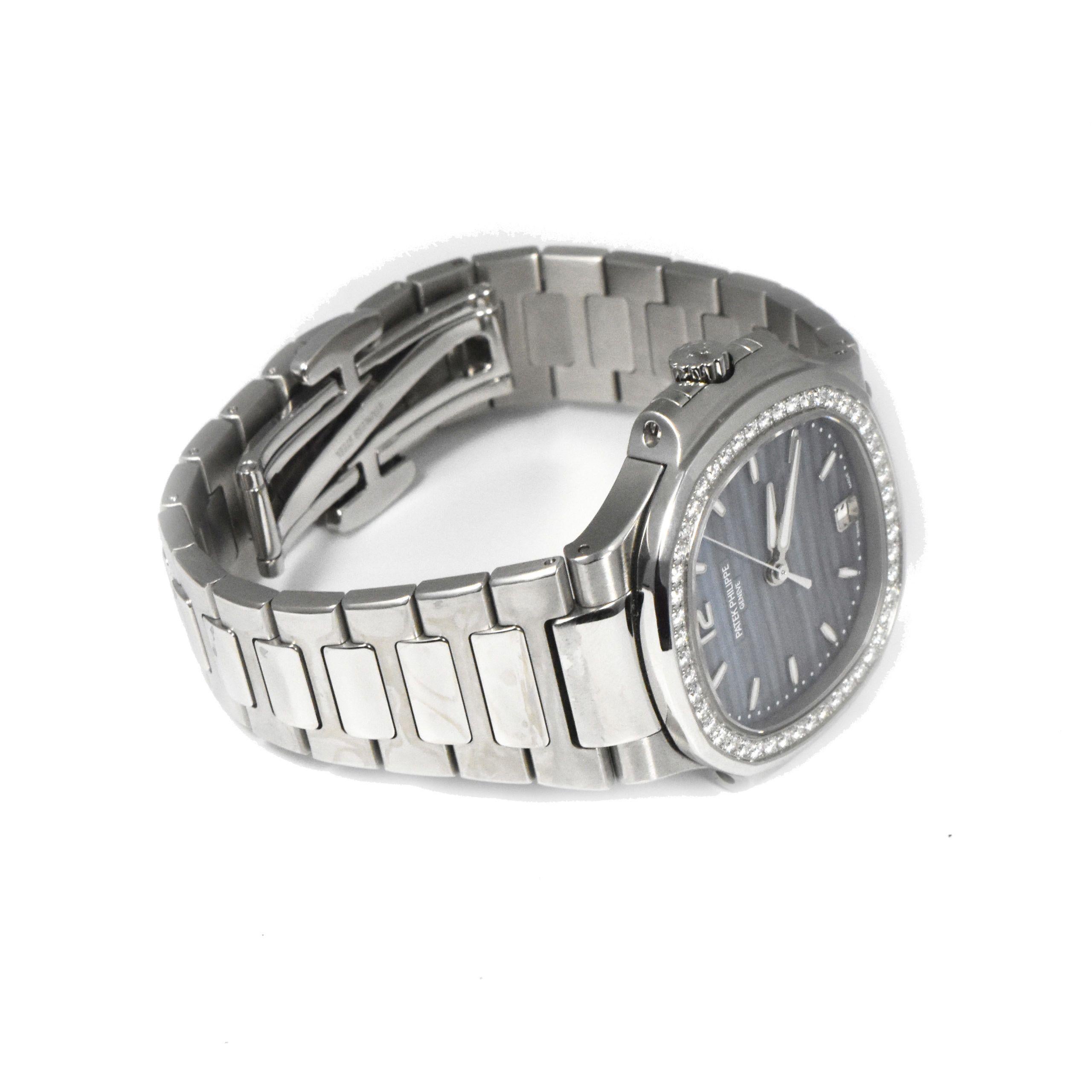 Patek Philippe Nautilus 7118 Blue Dial Diamond Bezel Steel Watch In Excellent Condition For Sale In Miami, FL