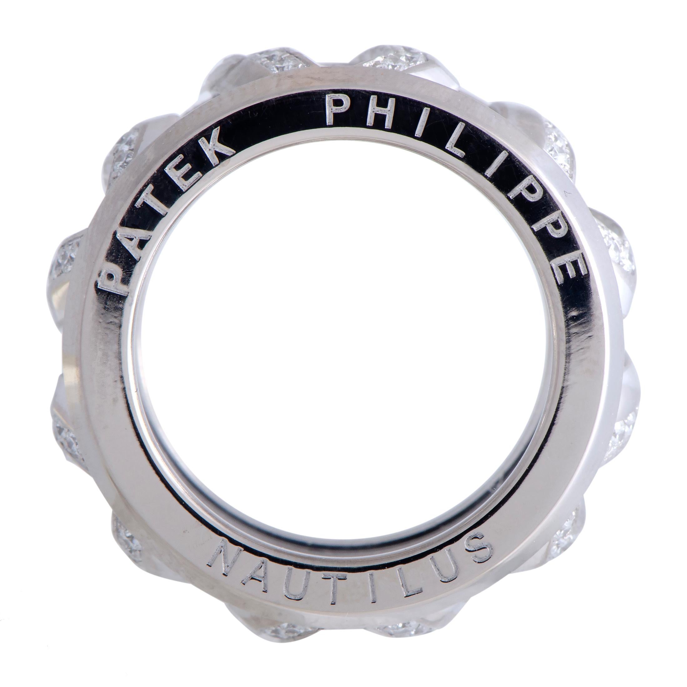 Created for the prestigious “Nautilus” collection by Patek Philippe, this exceptional ring boasts a splendidly refined design that gives it a distinctly sophisticated appeal. The ring is masterfully crafted from elegant 18K white gold and