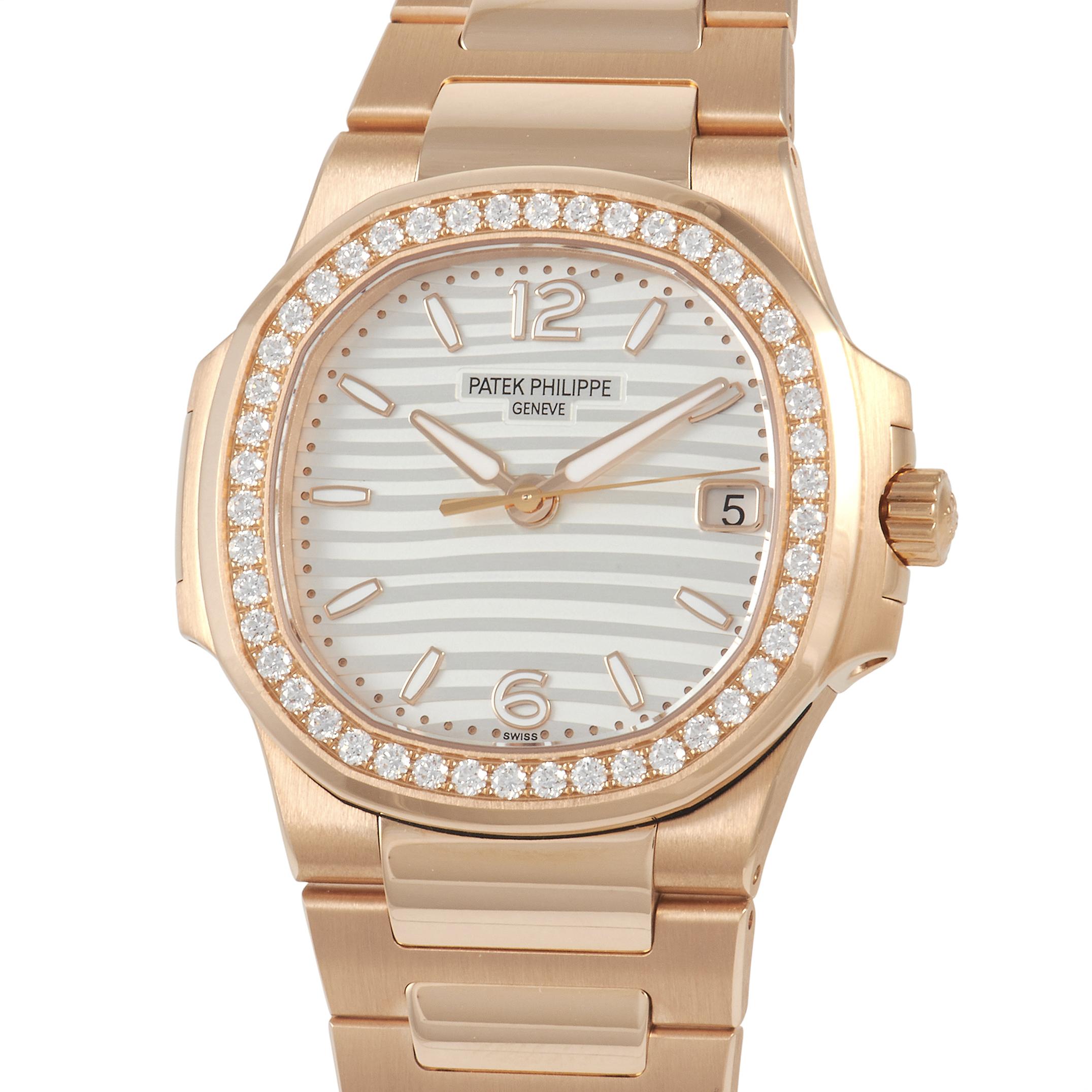 This Patek Philippe Nautilus Diamond Quartz Ladies Watch 7010/1R-011 stands out because of its refined elegance. It features an 18K rose gold case measuring 32mm in diameter and 6.5mm in height. It comes paired with a sparkling bezel set with 46