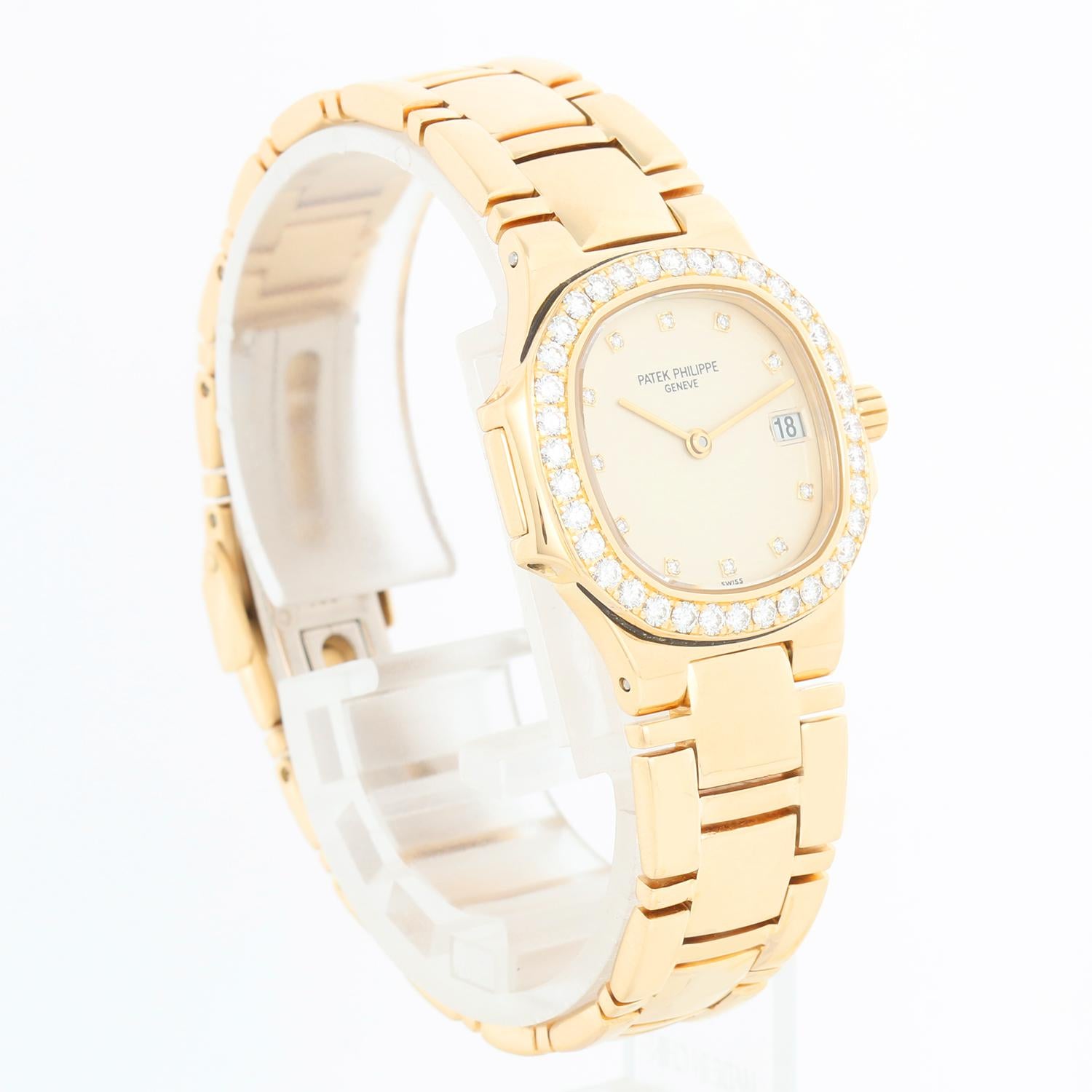 Patek Philippe Nautilus Ladies 18k Yellow Gold Diamond  Watch 4700/530J 001 In Excellent Condition In Dallas, TX