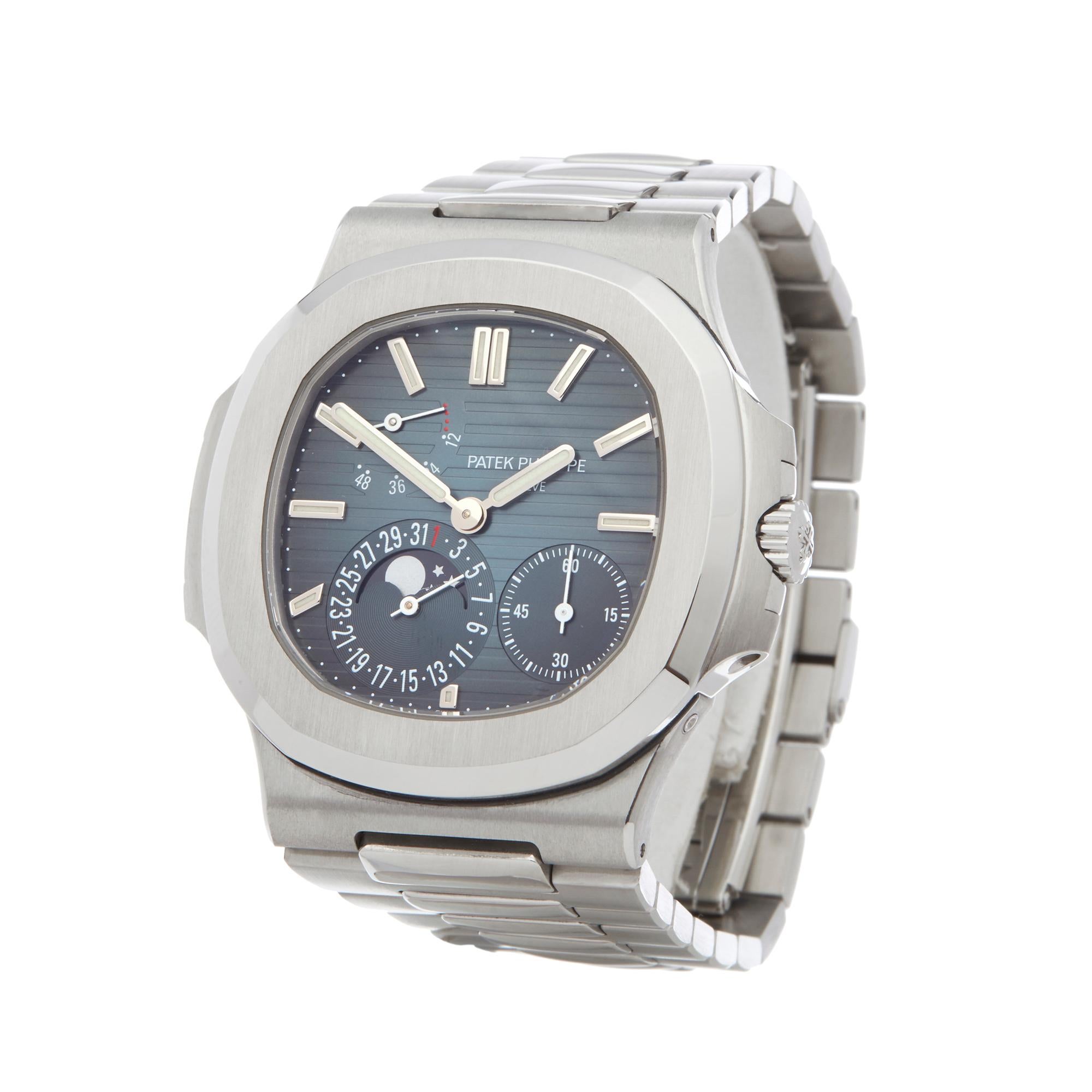 Ref: W6206
Manufacturer: Patek Philippe
Model: Nautilus 
Model Ref: 5712
Age: Circa 2010's
Gender: Mens
Complete With: Box & Extract from Archive to follow
Dial: Blue Baton
Glass: Sapphire Crystal
Movement: Automatic
Water Resistance: To