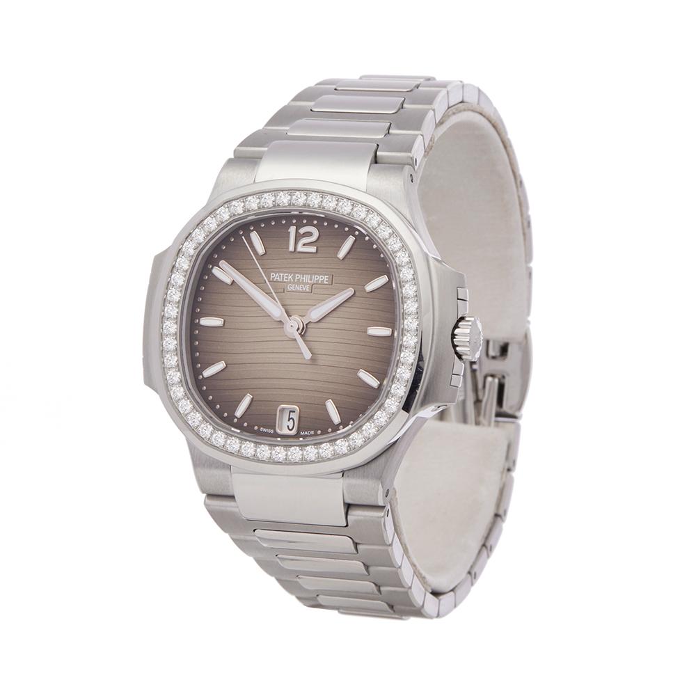 Ref: COM1901
Manufacturer: Patek Philippe
Model: Nautilus
Model Ref: 7018/1A
Age: 27th September 2018
Gender: Ladies
Complete With: Box, Manuals & Guarantee
Dial: Brown Arabic
Glass: Sapphire Crystal
Movement: Automatic
Water Resistance: To