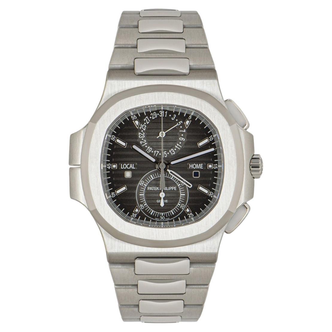 Patek Philippe Nautilus Reisezeit Chronograph NOS 5990/1A-001
