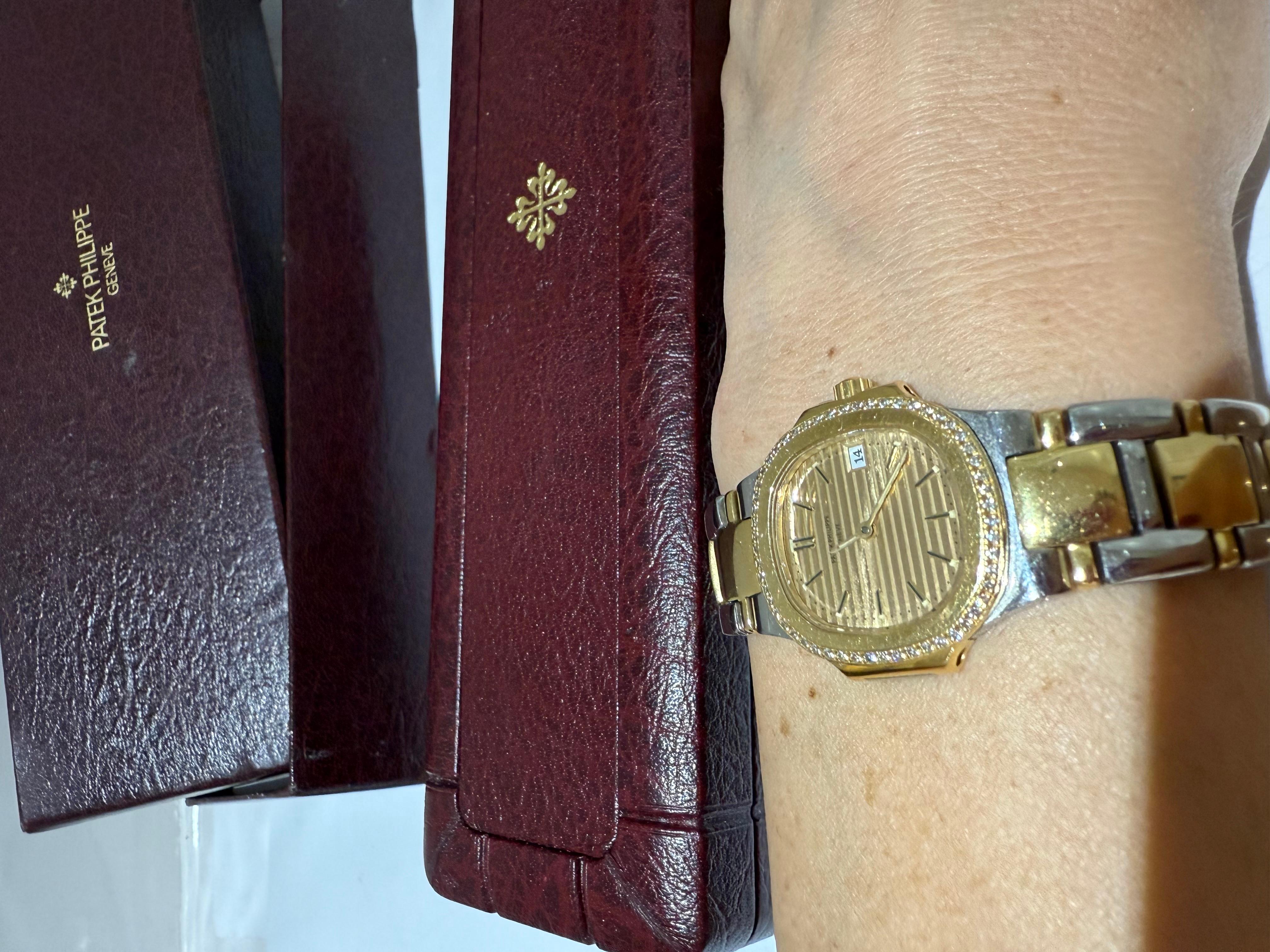 PATEK PHILIPPE Nautilus Vintage watch steel/yellow gold and diamonds For Sale 4
