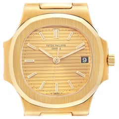 Patek Philippe Nautilus Gelbgold Champagner-Zifferblatt Herrenuhr 3800 Box Papiere