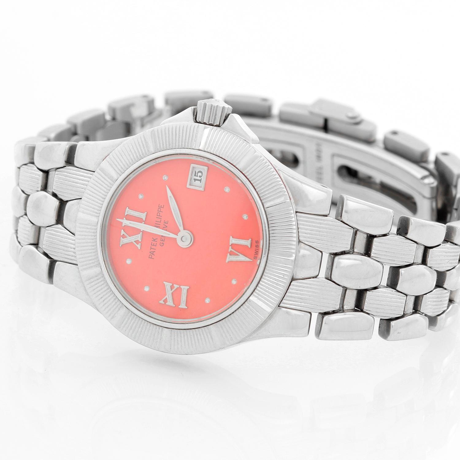 Patek Philippe Neptune Ladies Steel Watch 4880 / 1A - Quartz. Stainless steel case. Custom Pink colored dial with Roman numerals; date at 3 o'clock. Stainless steel Neptune bracelet - will fit a 6 1/4 inch wrist. Pre-owned with Patek Phlippe box.