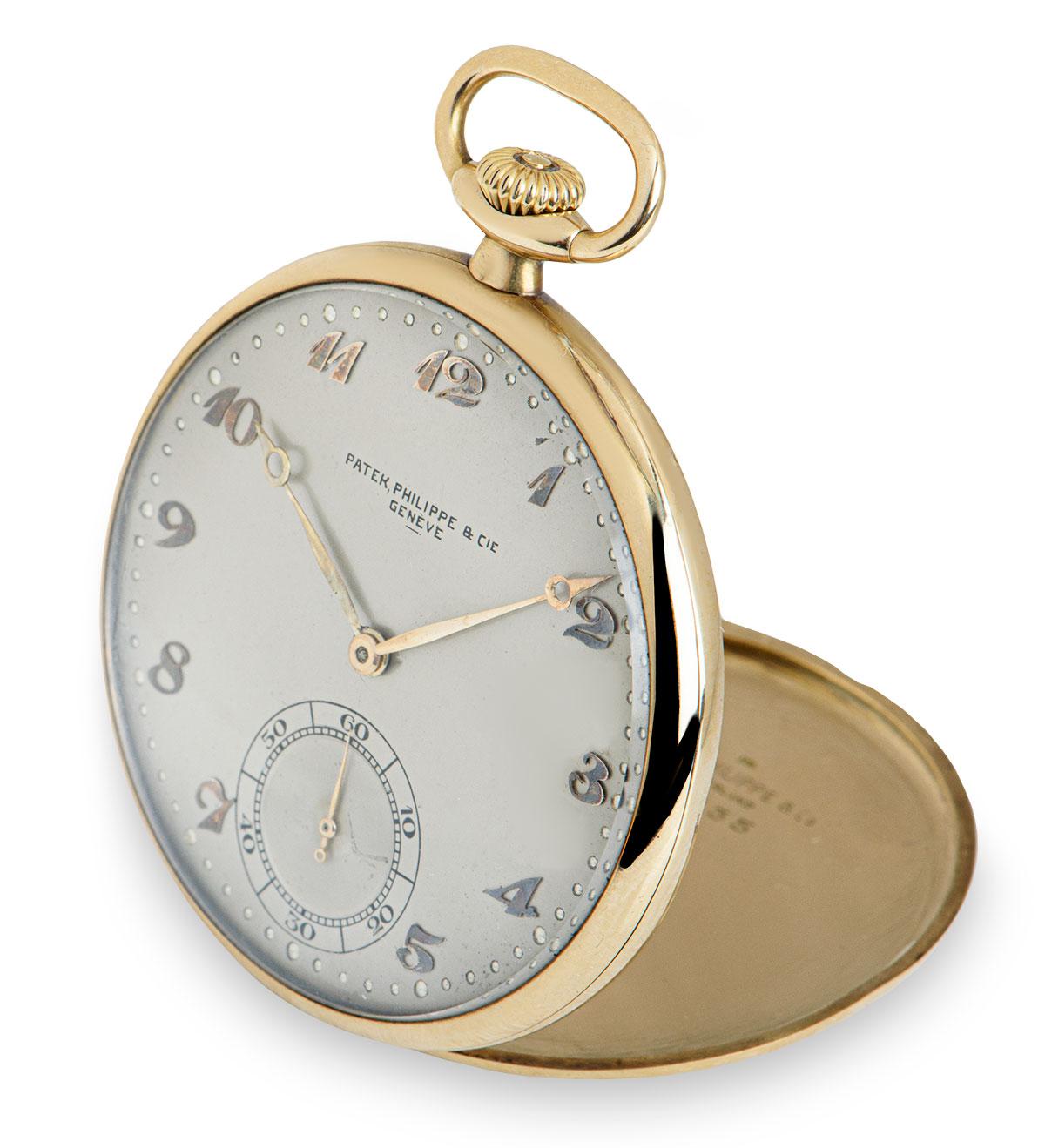 A 46 mm 18k Yellow Gold Open Face Vintage Gents Pocket Watch, silver dial with applied arabic numbers, small seconds at 6 0'clock, a fixed 18k yellow gold bezel, plastic glass, manual wind movement, in excellent condition, comes with a presentation