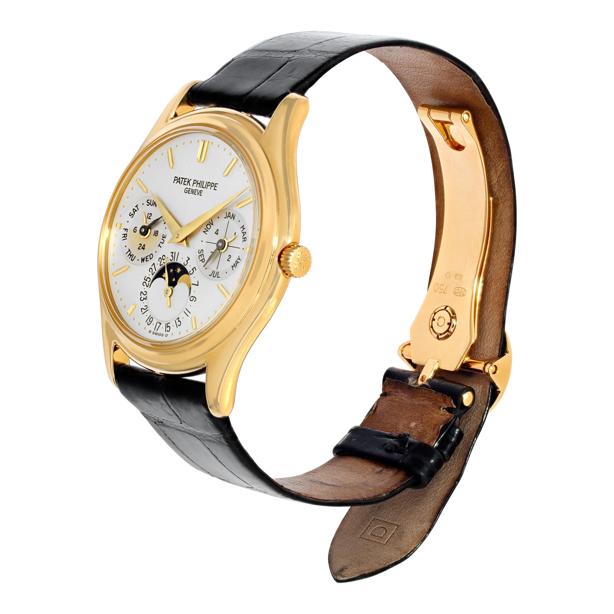 Patek Philippe Perpetual Calendar 3940j series 3 in 18k yellow gold on an alligator strap with deployant buckle. Factory service papers 2024. Auto w/ date, day, month, moonphase and perpetual calendar. 36 mm case size. With box. Ref 3940. Fine