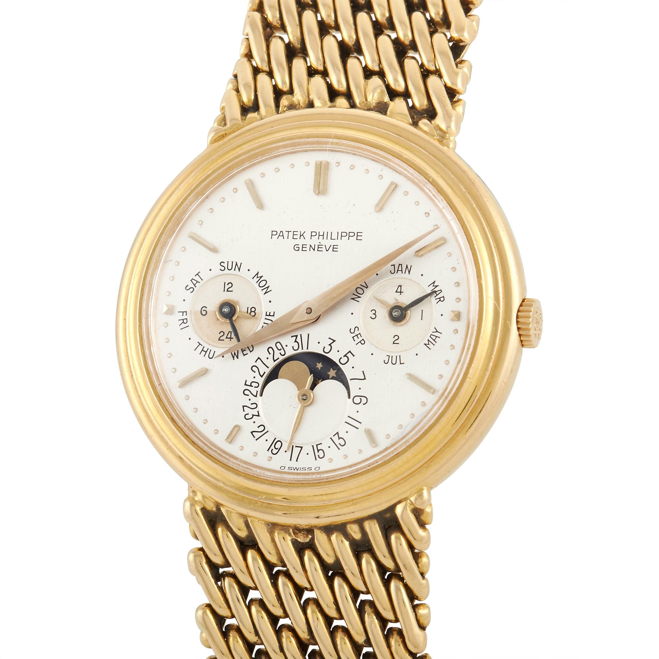 Displaying a perfect balance of elegance and practicality, the Patek Philippe Perpetual Calendar Moon Phase Watch 3945/IJ is a timepiece you'll forever adore. It features an 18K yellow gold case with woven-like bracelet of the same material. A cream