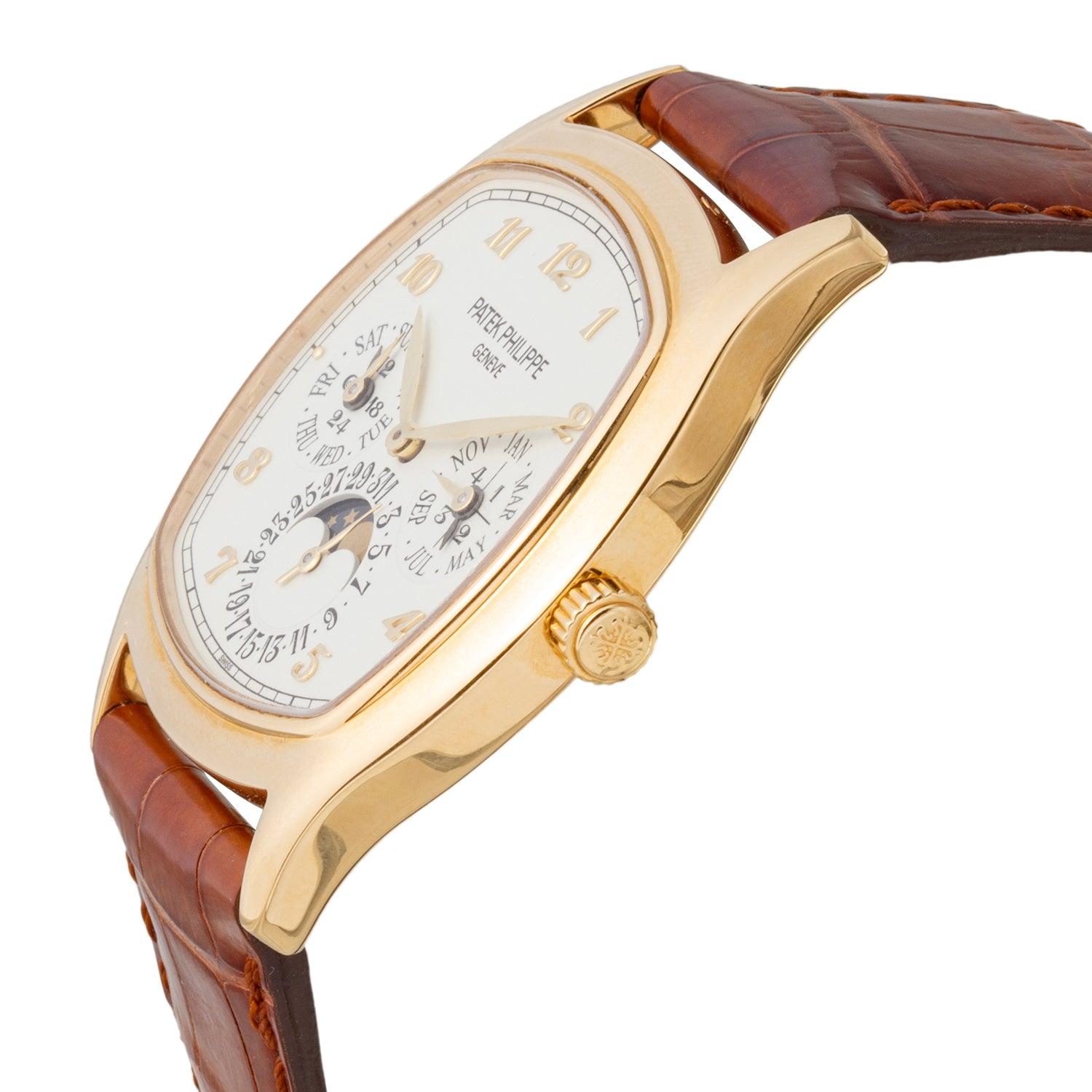 Pre-owned Patek Philippe Perpetual Calendar (ref. 5940J-001), featuring the Caliber 240 Q self-winding automatic movement; grained, cream-colored dial with applied gold Arabic numerals; perpetual calendar complication with displays for the day,