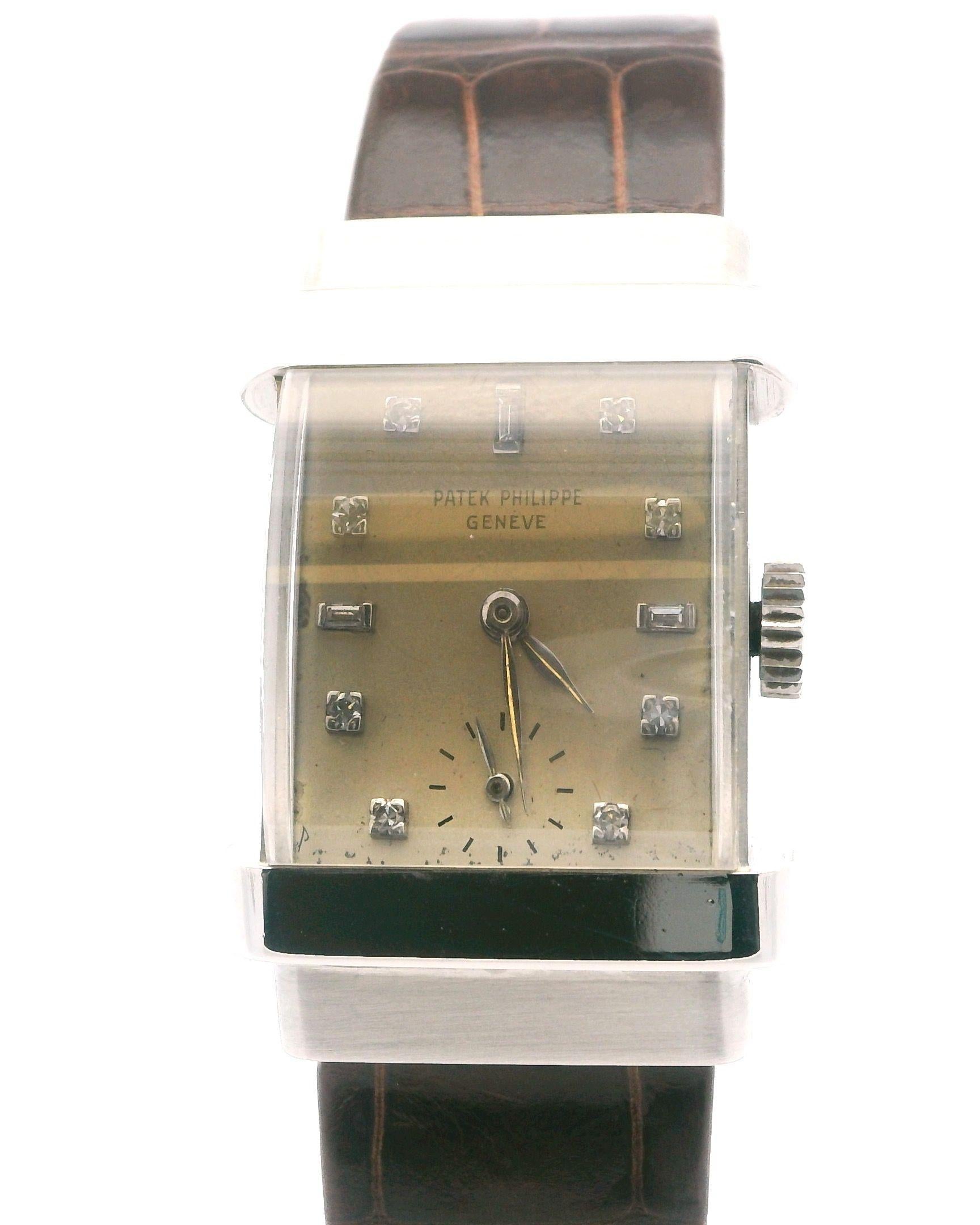 A striking rectangular watch from the 1940s.

Crafted by Patek Philippe, this exquisite piece features a manual movement encased in platinum.

The dial is adorned with diamond markers, adding a touch of elegance to its minimalist design.

The