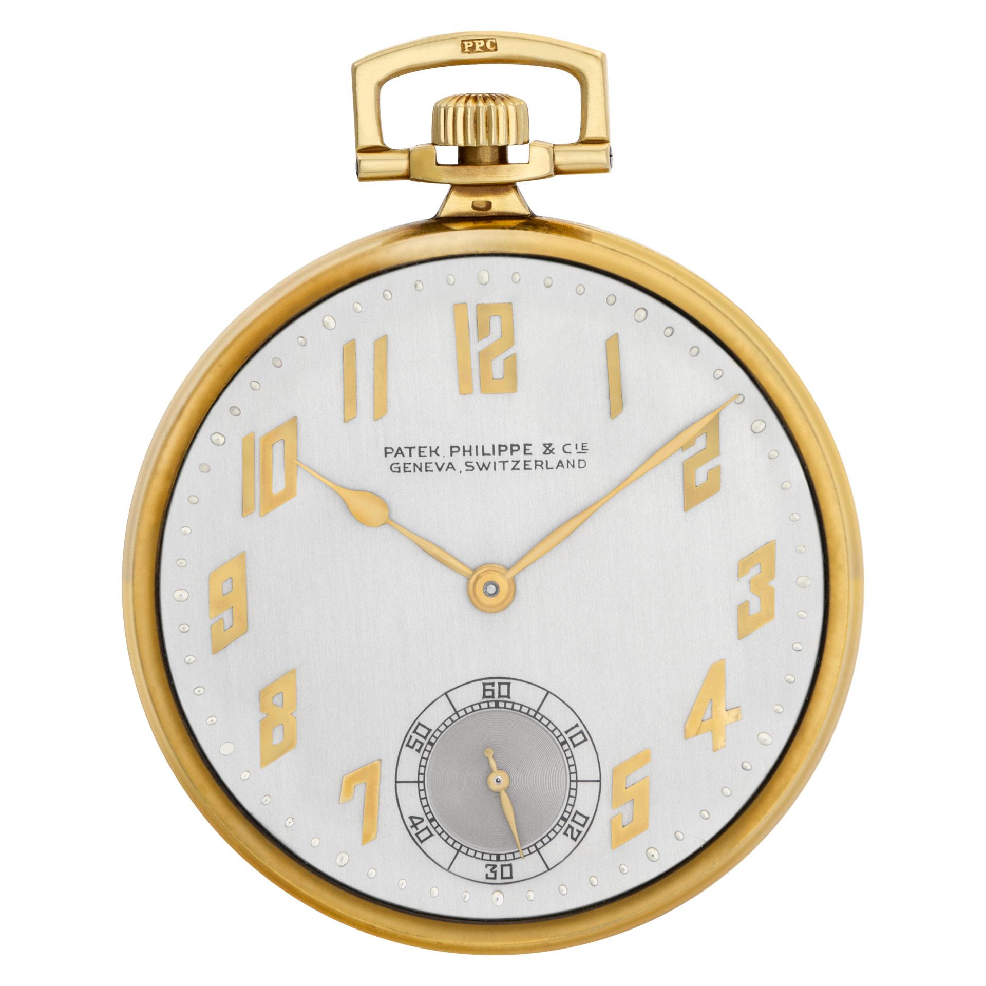 Patek Philippe pocket watch in 18k high polish yellow gold. Watch dial features gold applied Arabic numeral markers and sub-second dial. Manual wind. 42 mm case size. Circa 1926. Includes archive papers. Fine Pre-owned Patek Philippe