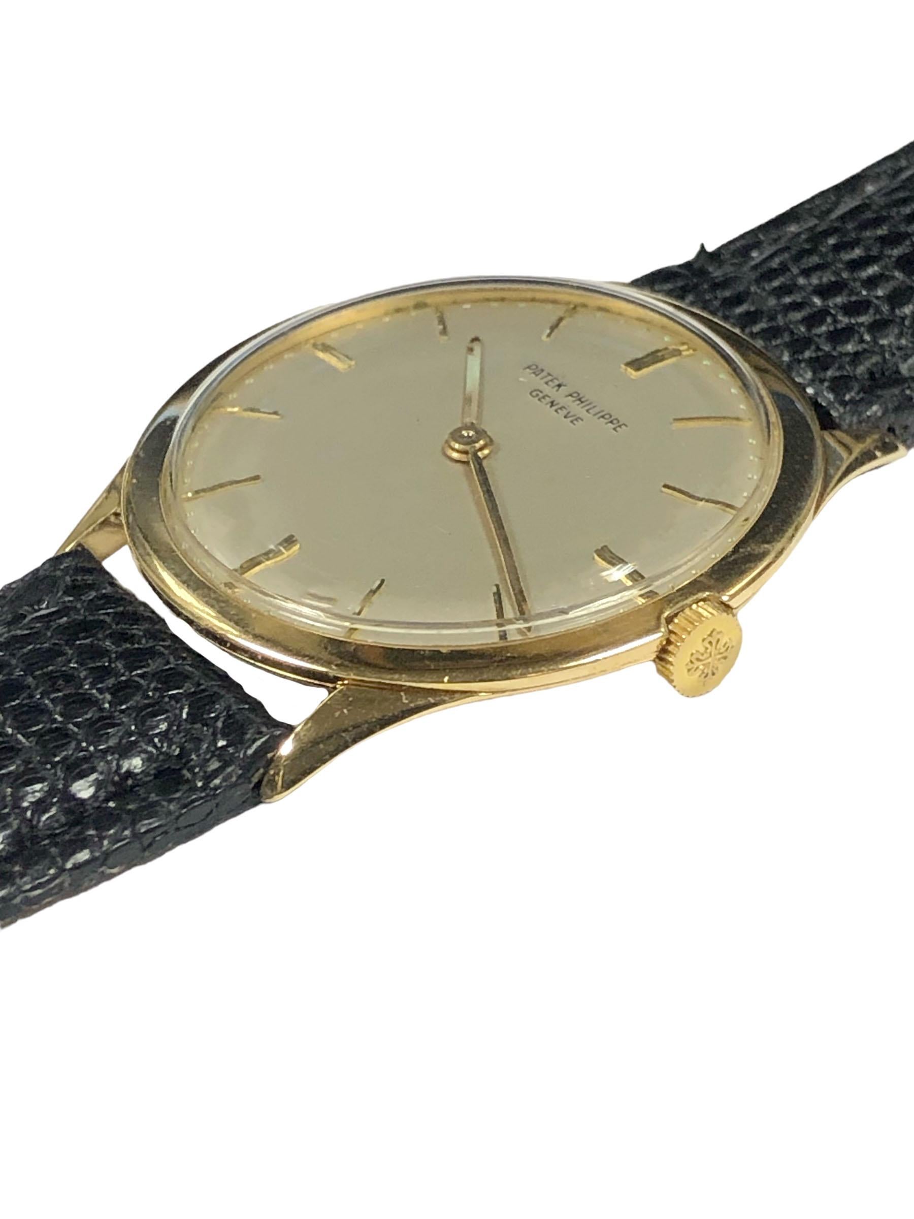 Circa 1960 Patek Philippe Reference 2589 Wrist Watch, 33 M.M. 18k Yellow Gold 3 piece case. 18 Jewel Mechanical, Manual wind  Nickle lever movement. Original mint condition Silver Satin dial with raised Gold markers. New Black Lizard Strap, watch