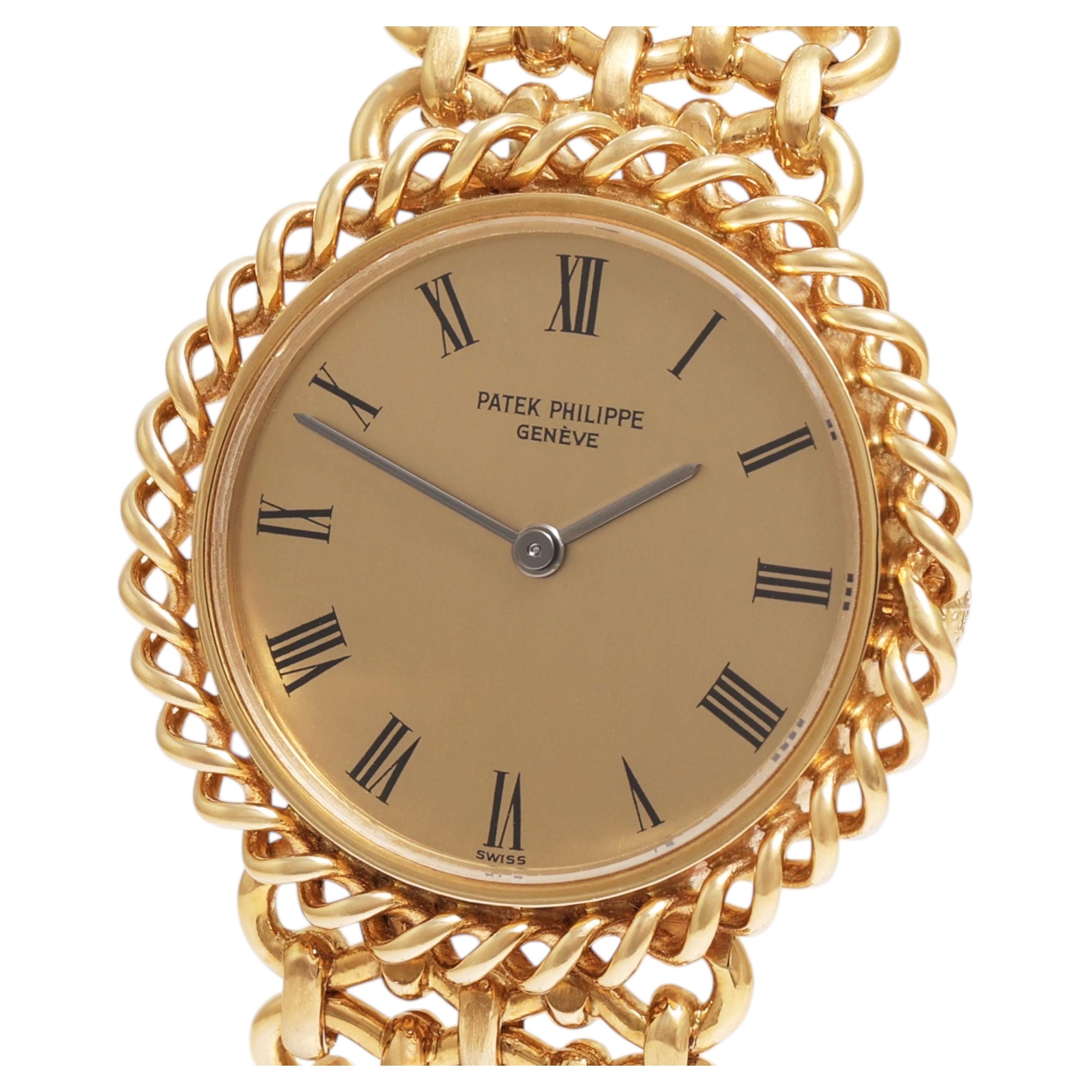 How do I manually wind a Patek Philippe?