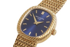 Patek Philippe Ref. 4461/1 – 18K Yellow Gold Bracelet Watch Sunburst Blue Dial