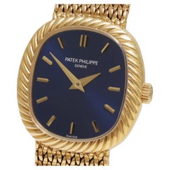 Patek Philippe Ref. 4461/1 – 18K Yellow Gold Bracelet Watch Sunburst Blue Dial