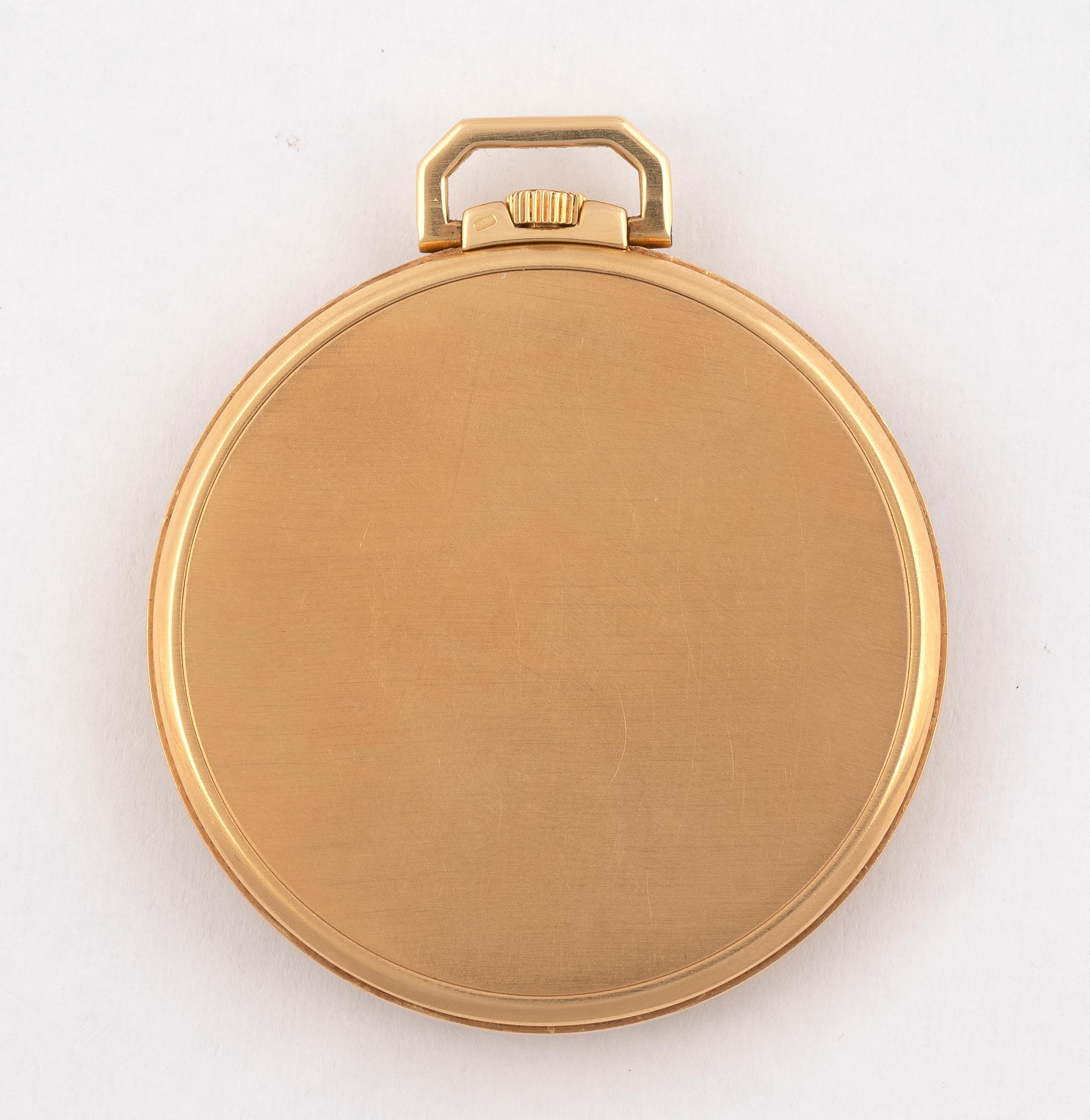 Patek Philippe & Cie, Genève, Ref. 600. Made circa 1950. Very fine and elegant, 18K yellow gold keyless dress pocket watch.
Three-body, polished and brushed, inclined stepped bezel, flat band, snap-on back with engraved monogram, the interior with