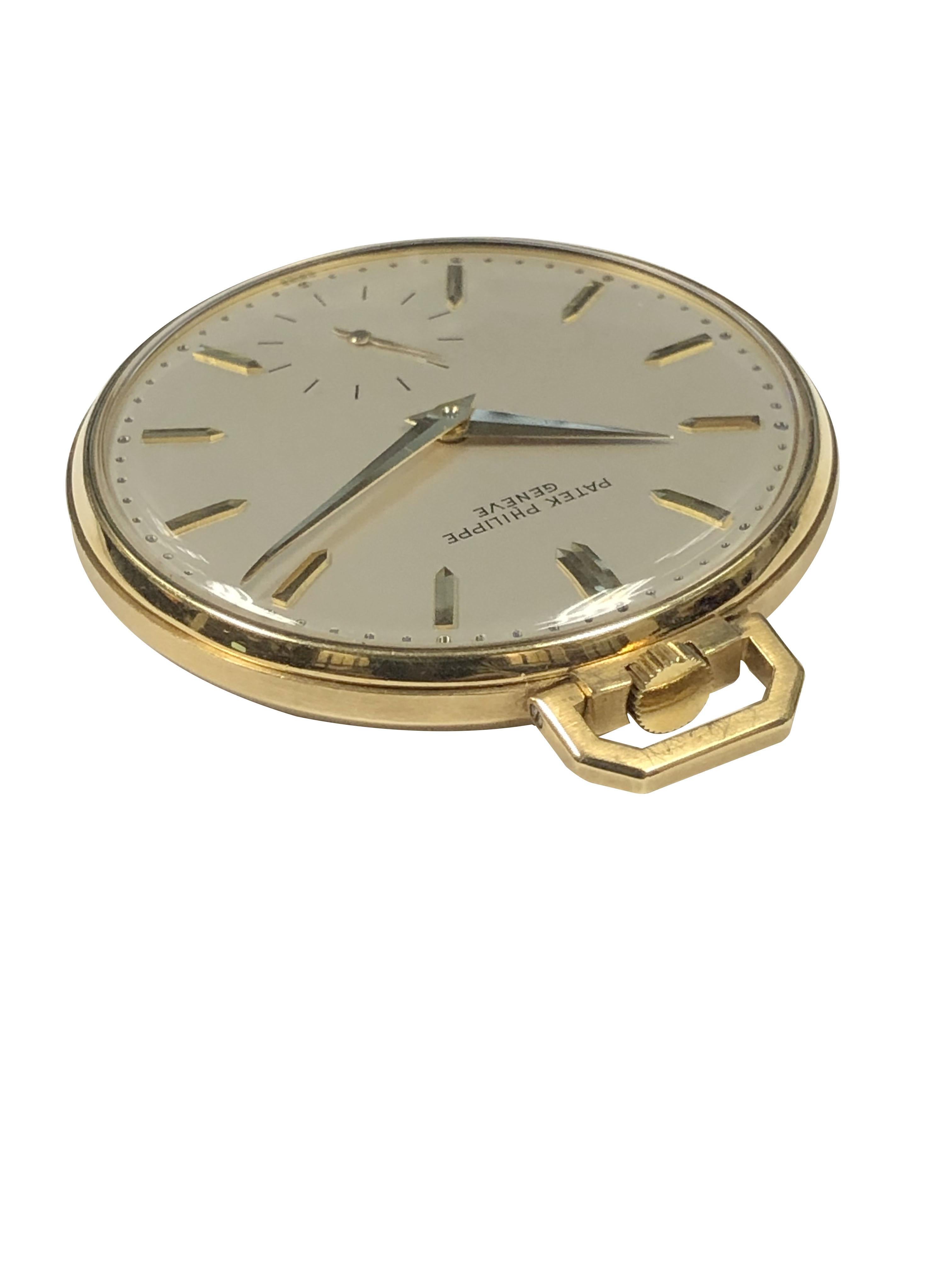 Circa 1950 Patek Philippe Reference 600 Pocket Watch, 43 M.M. 18K Yellow Gold  3 piece case, 18 Jewel mechanical, manual wind movement, Original Silver Satin Dial with Applied Gold markers, sub seconds chapter and Gold Hands. Triple signed Patek