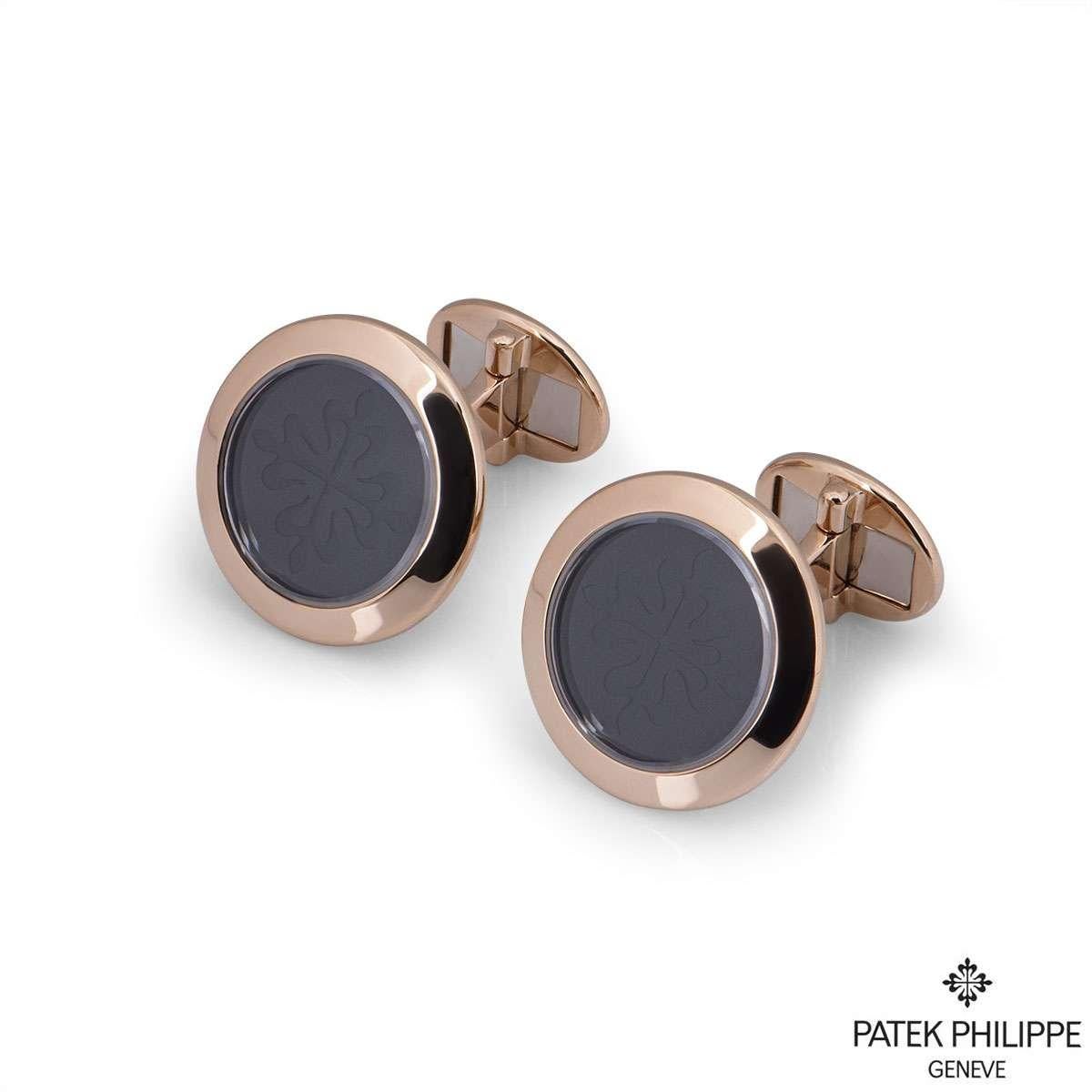 A sublime pair of 18k rose gold Patek Philippe cufflinks from the Calatrava collection. Each cufflink is set to the centre with onyx, engraved with the iconic Calatrava cross emblem. The feature motif measures 1.9cm in diameter and the body of the