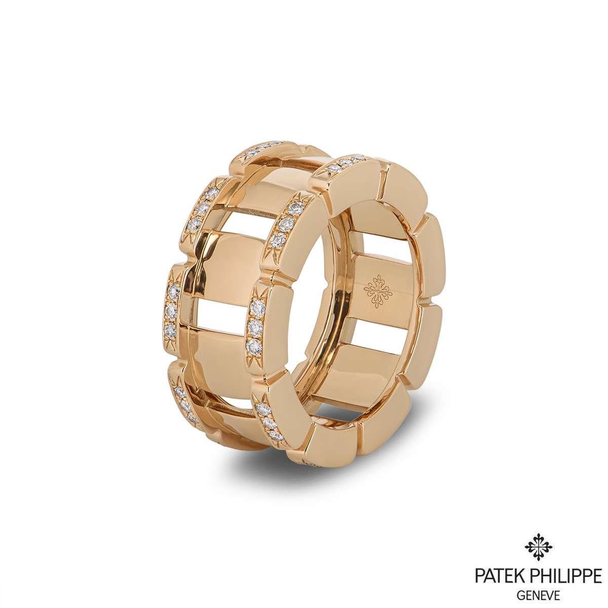 A stylish 18k rose gold ring from the Twenty-4 collection by Patek Philippe. The openwork ring is composed of 54 round brilliant cut diamonds set around the outer edges totalling 0.47ct. The ring measures 1cm in width, is a size UK P - EU 56 - US