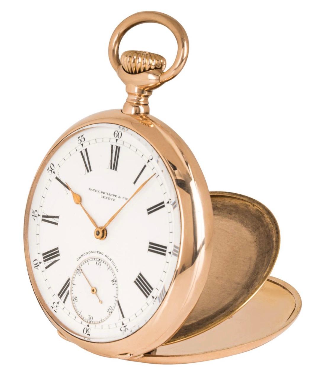 A Patek Philippe 18ct rose gold, keyless lever Gondolo open face pocket watch, 1910.

Dial: A perfect white enamel Roman dial signed Patek Philippe & Co Genève with sub second dial signed above Chronometro Gondolo with gold spade hands covered by a