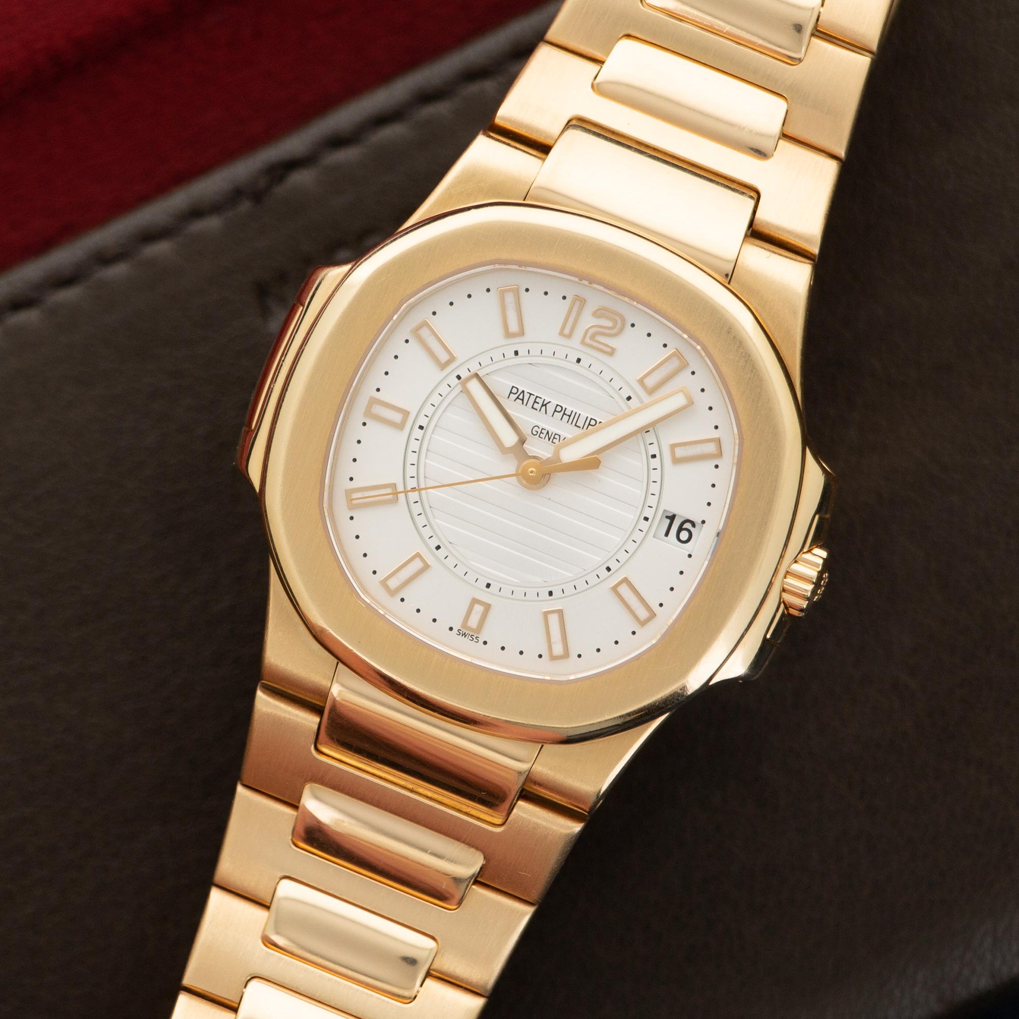 Patek Philippe Rose Gold Nautilus Watch Ref. 7011/1R. 32mm Diameter. All Original and in Excellent Condition. 