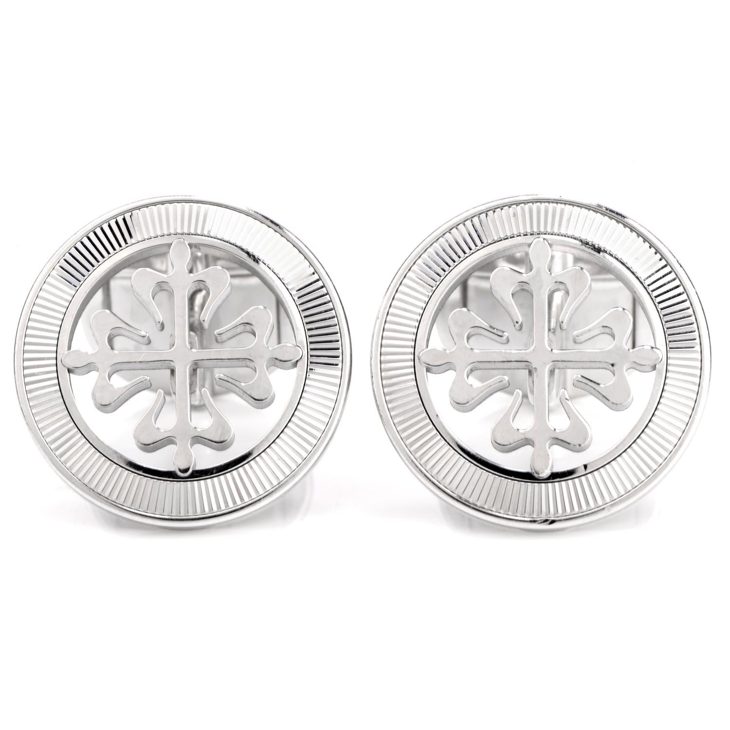 These Patek Philippe cufflinks Calatrava Cross were crafted in 18K gold, Circa 2010. 

Each round guilloched outer ring, inner Calatrava cross decoration, with rigid connecting bar to swivel terminal,

signed 'Patek Philippe Geneva

19mm