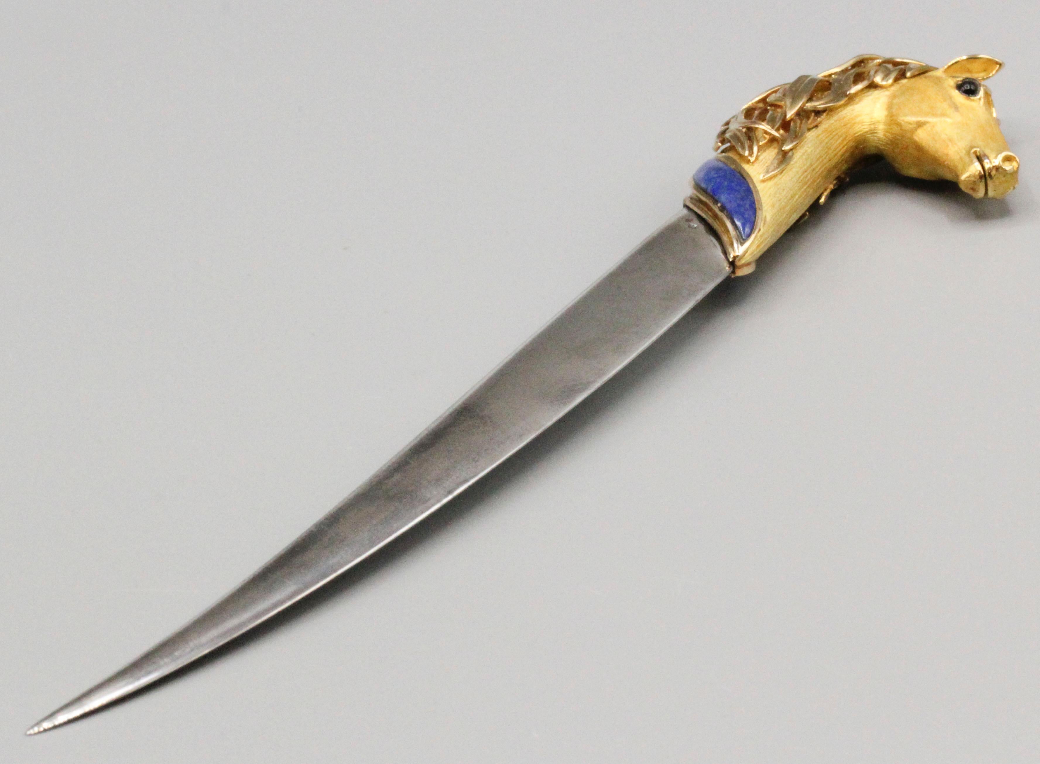 Very fine and rare letter opener by Patek Philippe, cicar 1960-70s. The letter opener is designed as a horse head with a satin like finish and polished gold hair made of 18k gold; the head is further accented with cabochon sapphire eyes and a lapis