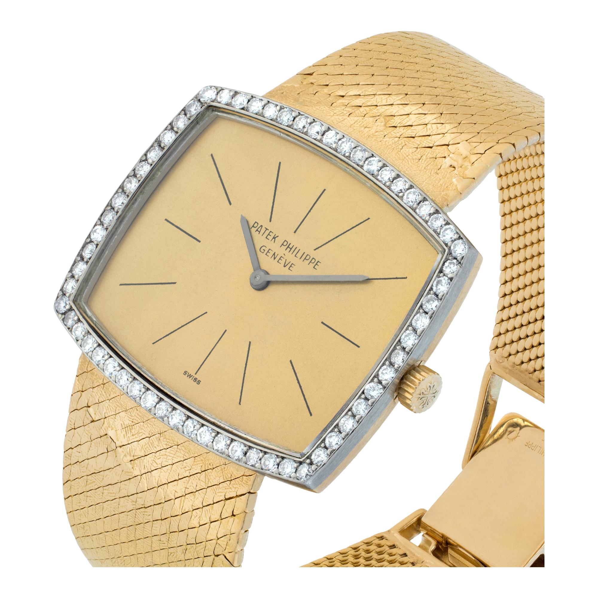 Patek Philippe Classic with diamond bezel in 18k with refinished dial. Manual. Fits 6 inches wrist. Ref 3528/2. Circa 1967. Fine Pre-owned Patek Philippe Watch. Certified preowned Vintage Patek Philippe Square 3528/2 watch is made out of yellow gold