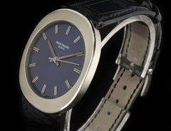 Patek Philippe Stainless Steel Blue Dial Oval Case Automatic Wristwatch Ref 3580