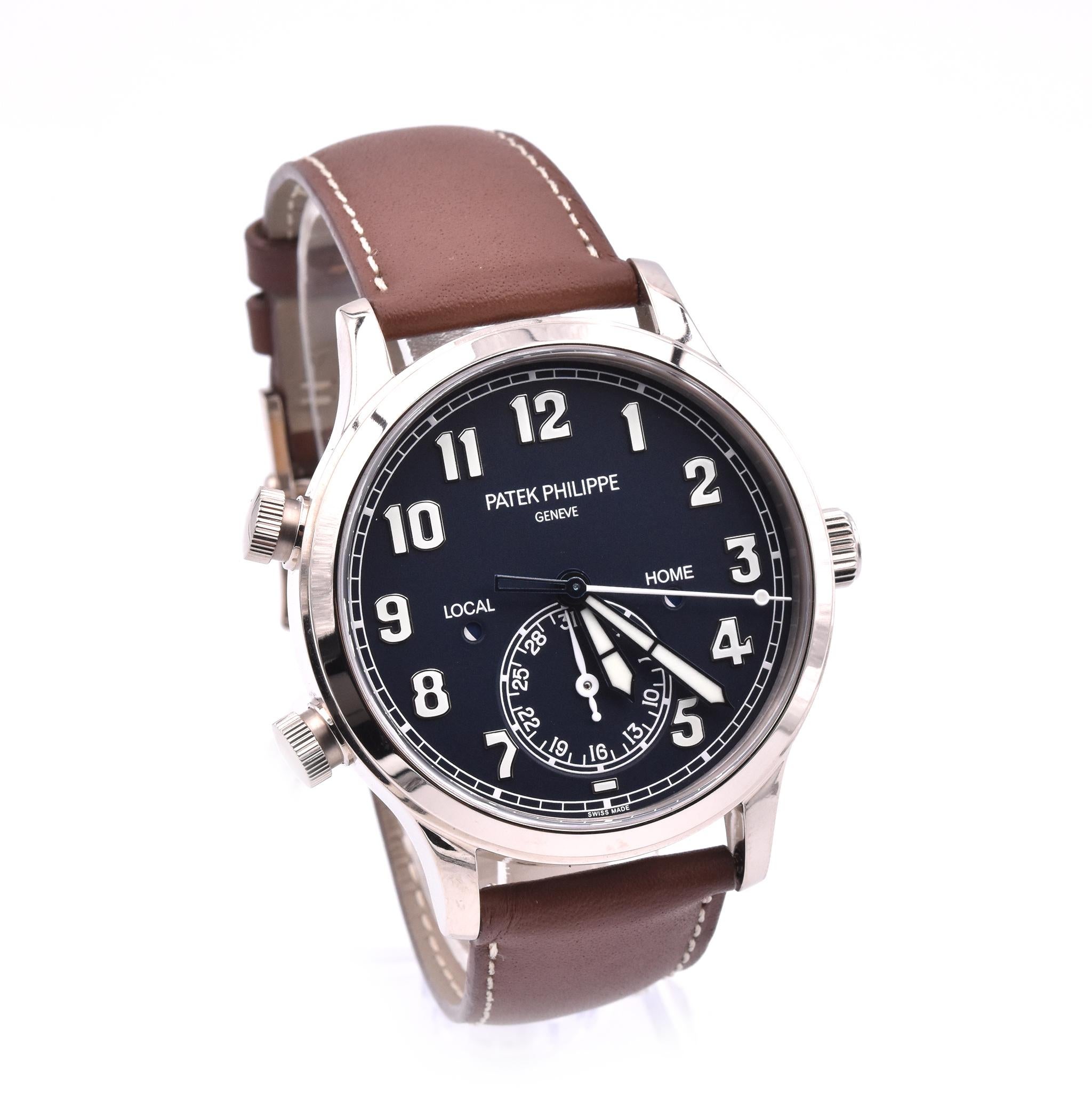 Movement: automatic
Function: hours, minutes, seconds, date, dual time zone and day/night indicator
Case: 42mm round case, sapphire protective crystal, push/pull crown
Dial: black dial, arabic numbers
Band: brown Patek Philippe leather strap with