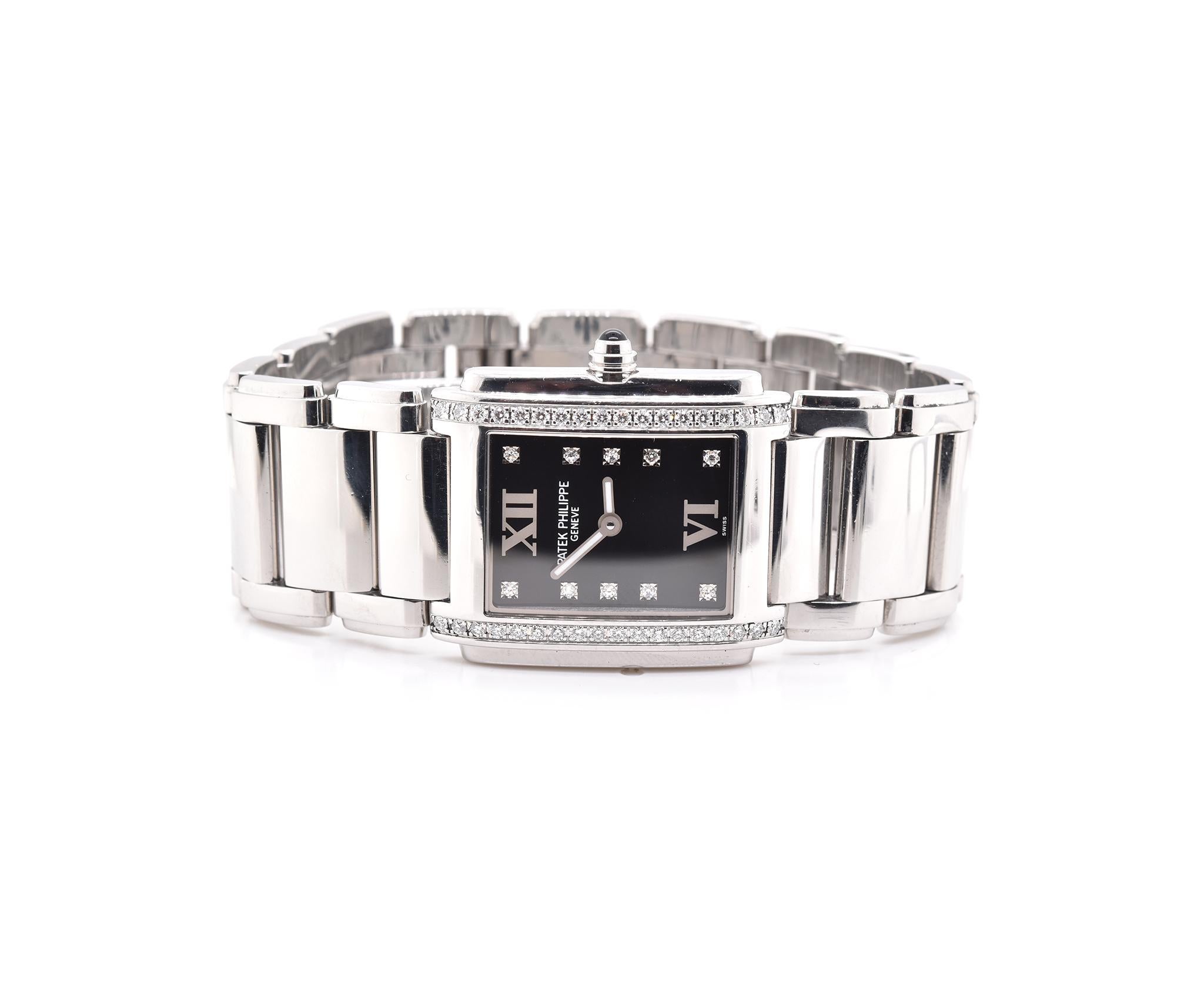 Movement: quartz, Caliber E15 
Function: hours, minutes
Case: 25 X 30mm stainless steel rectangle case, sapphire crystal
Dial: “Forever Black” diamond hour markers
Band: Patek Philippe stainless steel bracelet with fold-over clasp
Reference #: