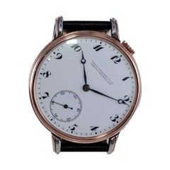 Patek Philippe Steel and 18Kt. Rose Gold Oversized Watch with Enamel Dial 