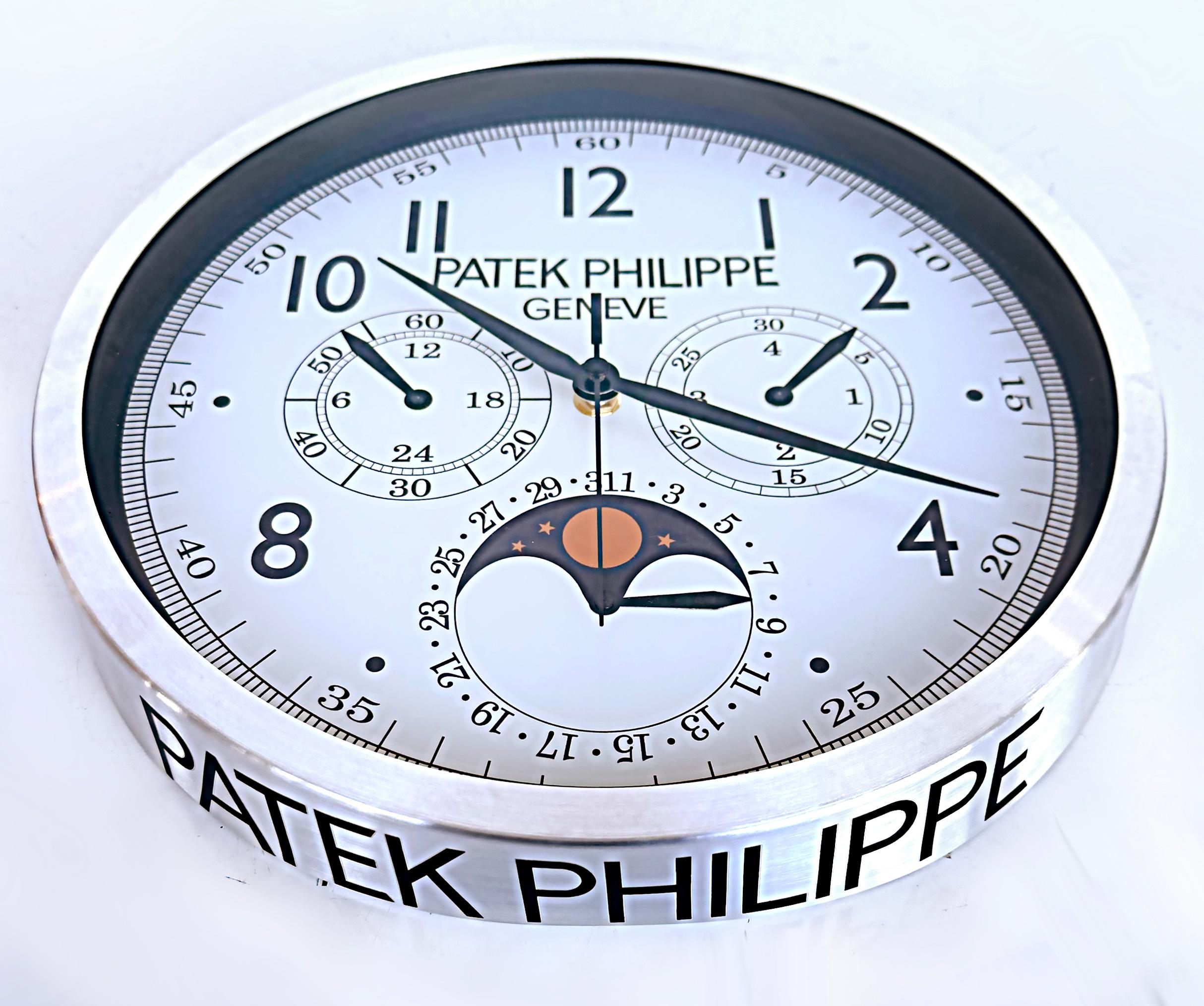 Patek Philippe, Switzerland dealer's advertising wall clock.

Offered for sale is a Patek Philippe (Geneve, Switzerland) dealer's advertising chronograph wristwatch model wall clock. This is a great gift for the watach lover. The clock is